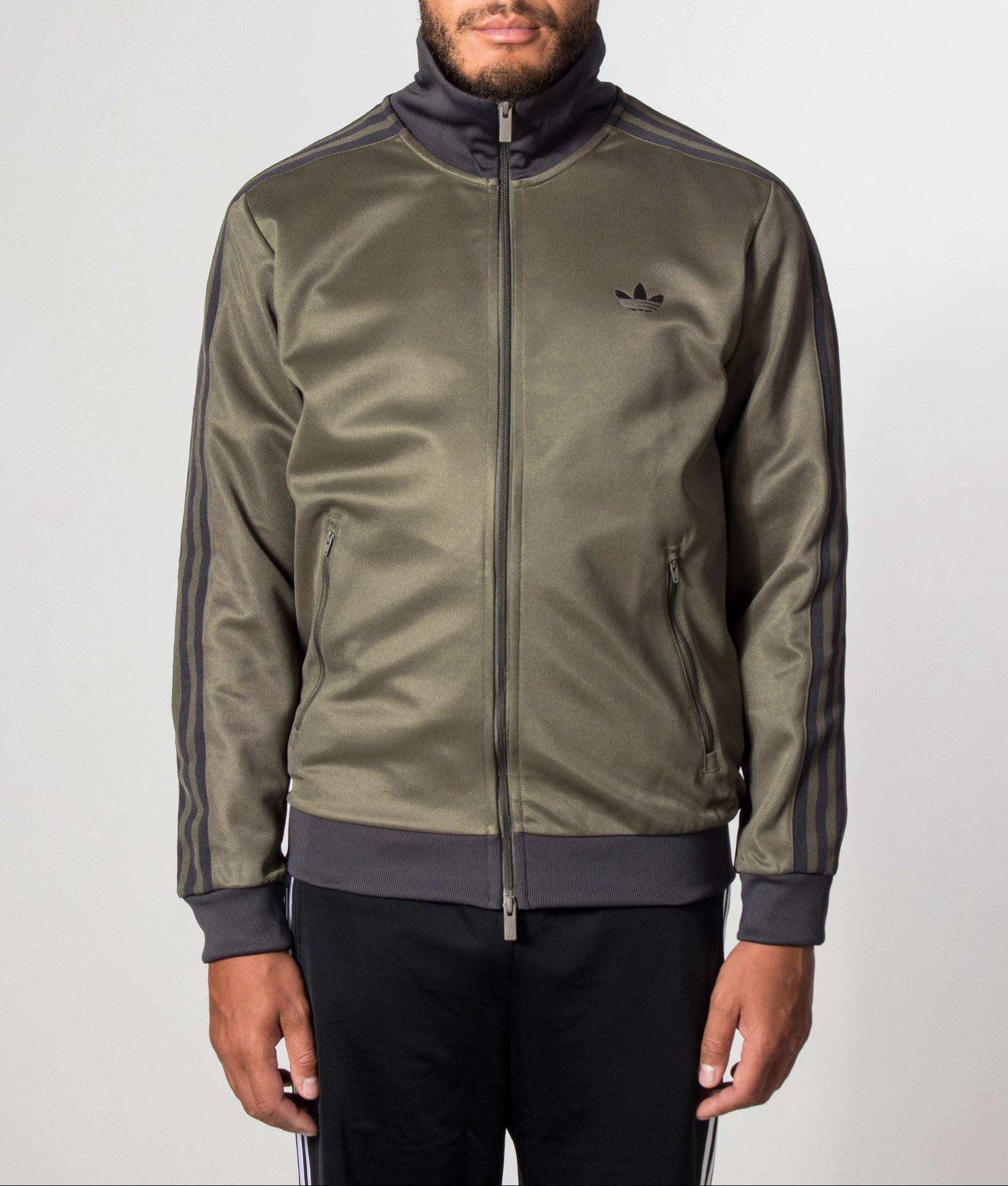 adidas Originals Beckenbauer Classic Track Top in Branch at EQVVS Menswear. Model front shot.