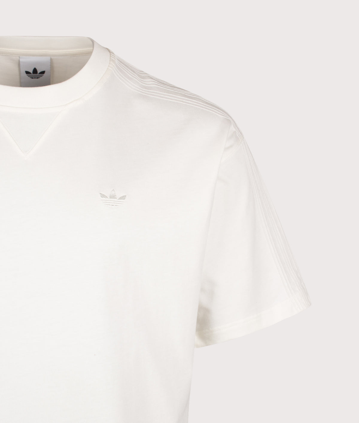 adidas Originals Loose Fit Premium Essentials T-Shirt in Off White at EQVVS Menswear. Detail shot.