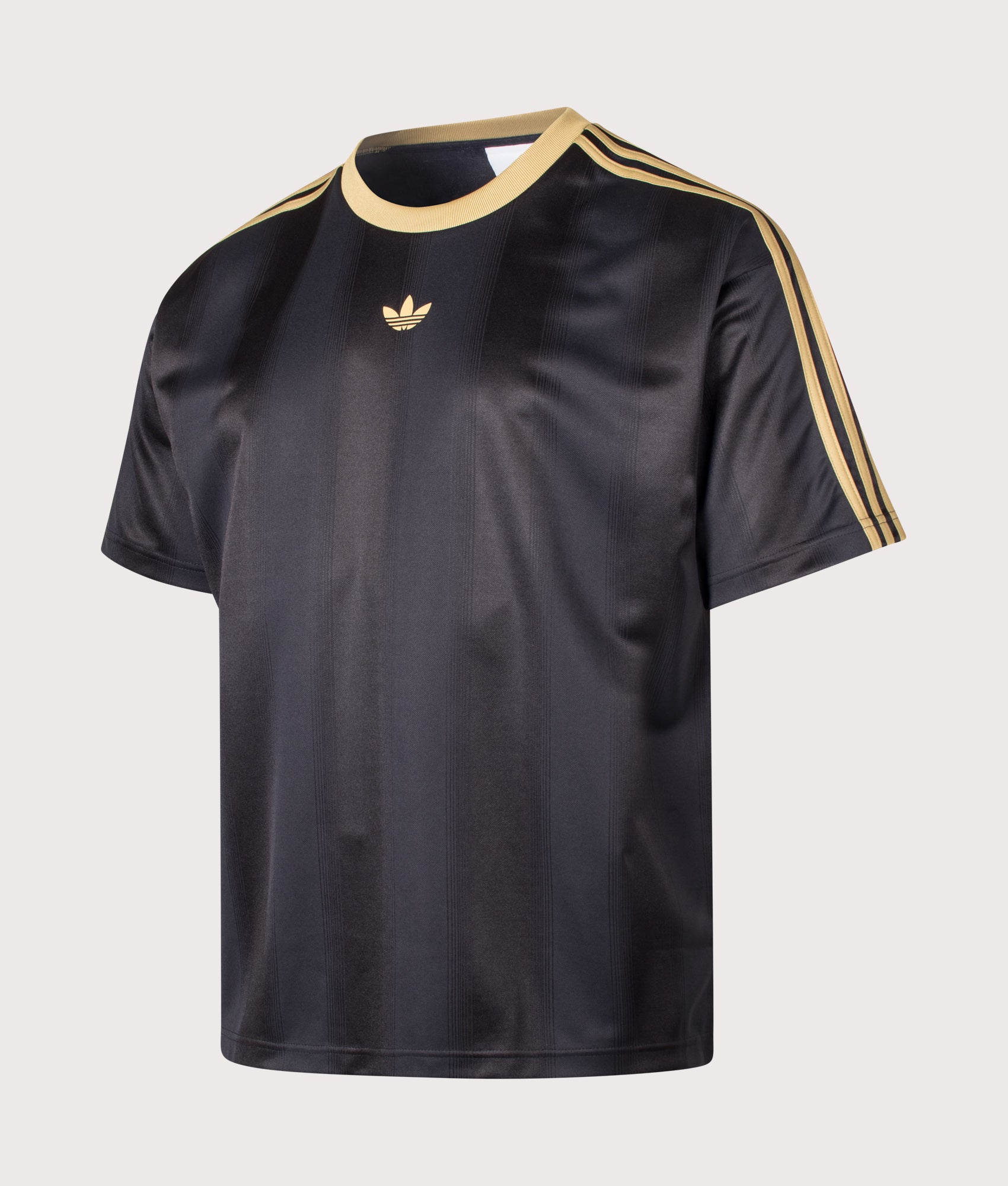 adidas Originals Oversized Fit Adicolour Jacquard Jersey T-Shirt in Black and Dark Football Gold at EQVVS Menswear. Angled front shot.