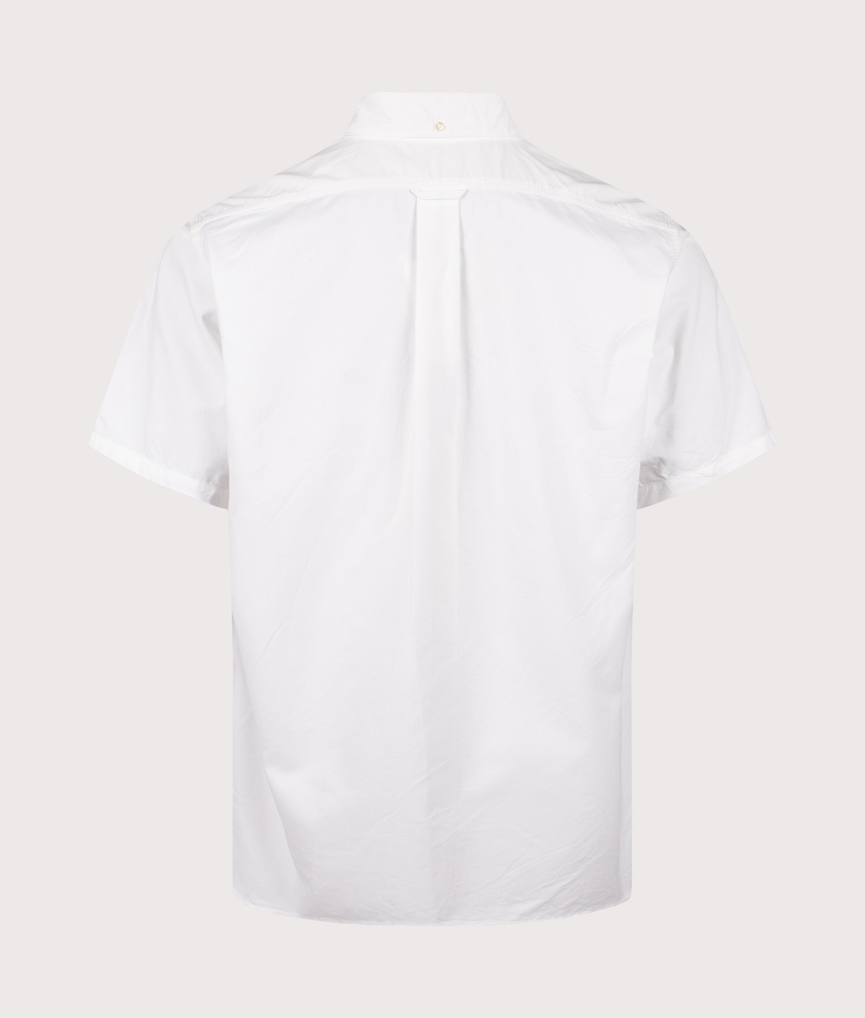nanamica Relaxed fit Button Down Wind Short Sleeve Shirt in White at EQVVS Menswear. Back shot.
