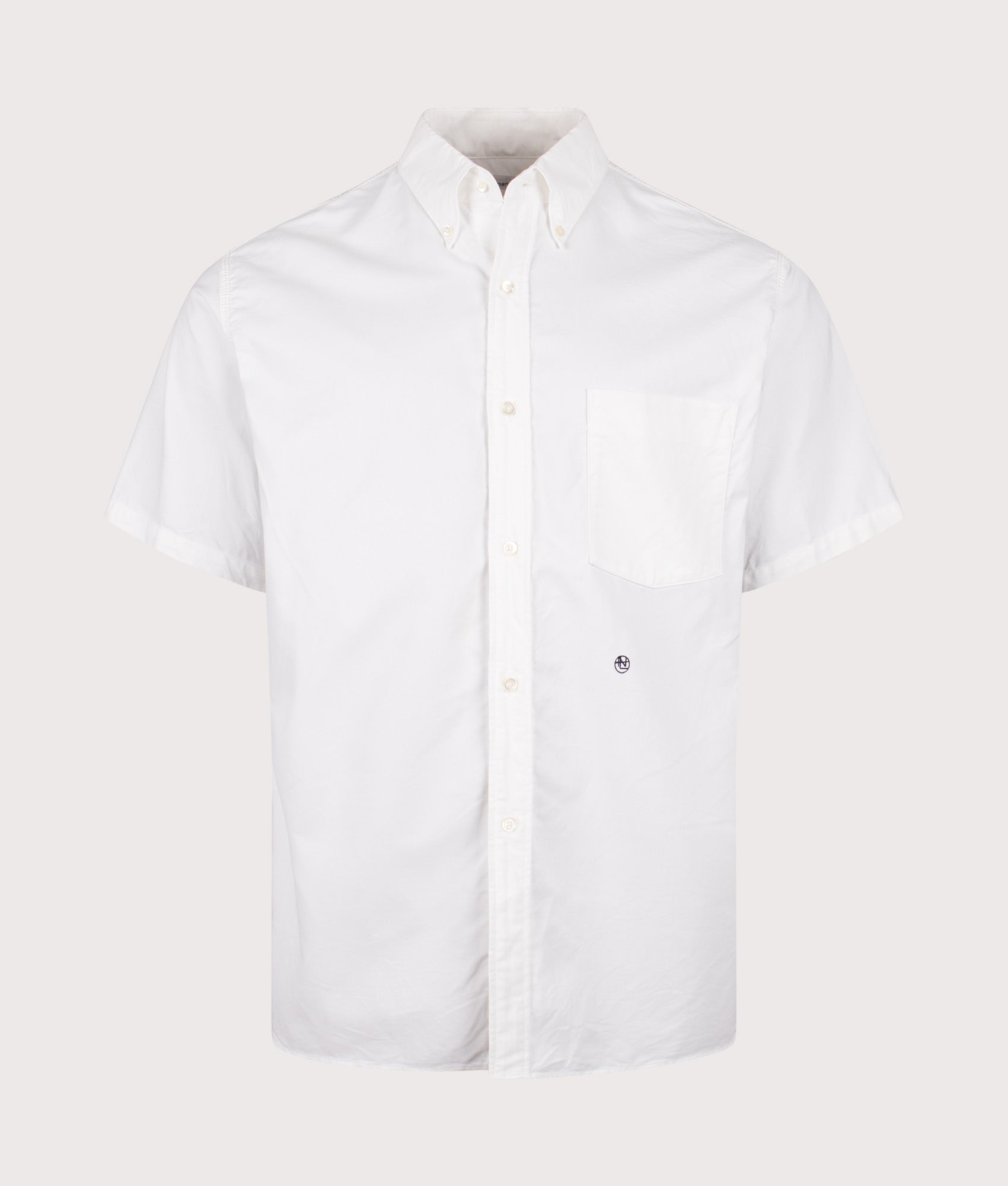 nanamica Relaxed fit Button Down Wind Short Sleeve Shirt in White at EQVVS Menswear. Front shot.