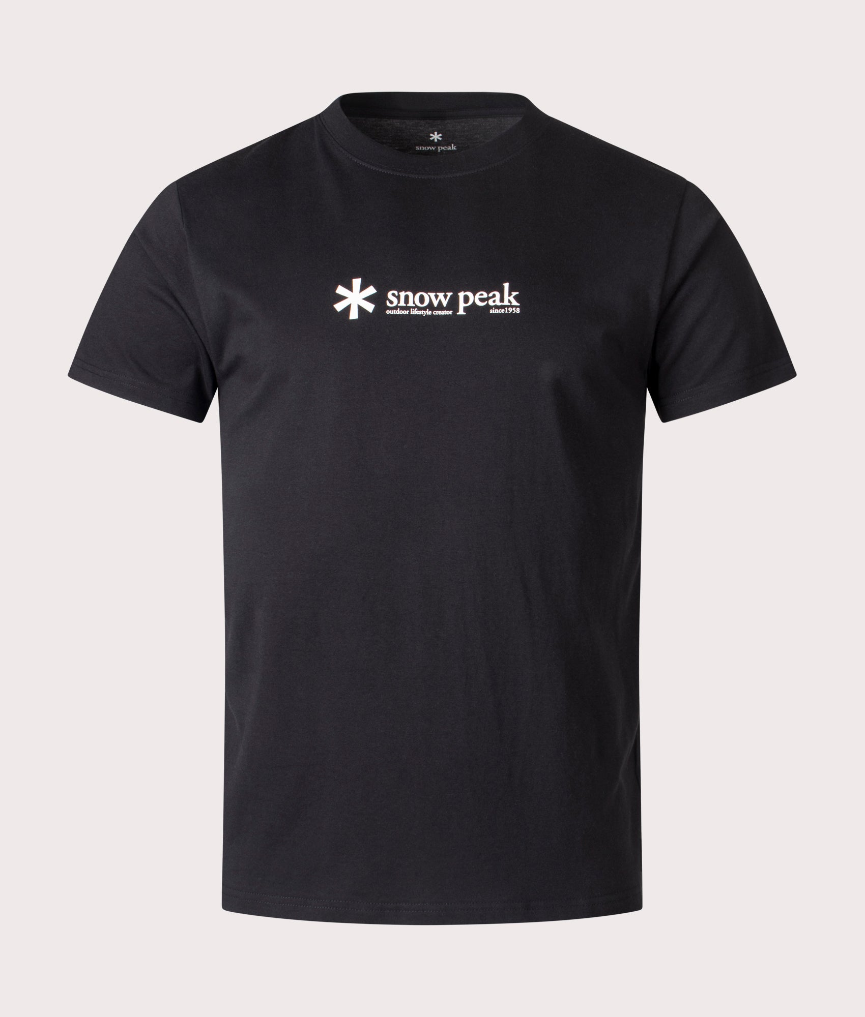 Snow Peak Soft Cotton Logo T-Shirt in black at EQVVS Menswear. Front shot.