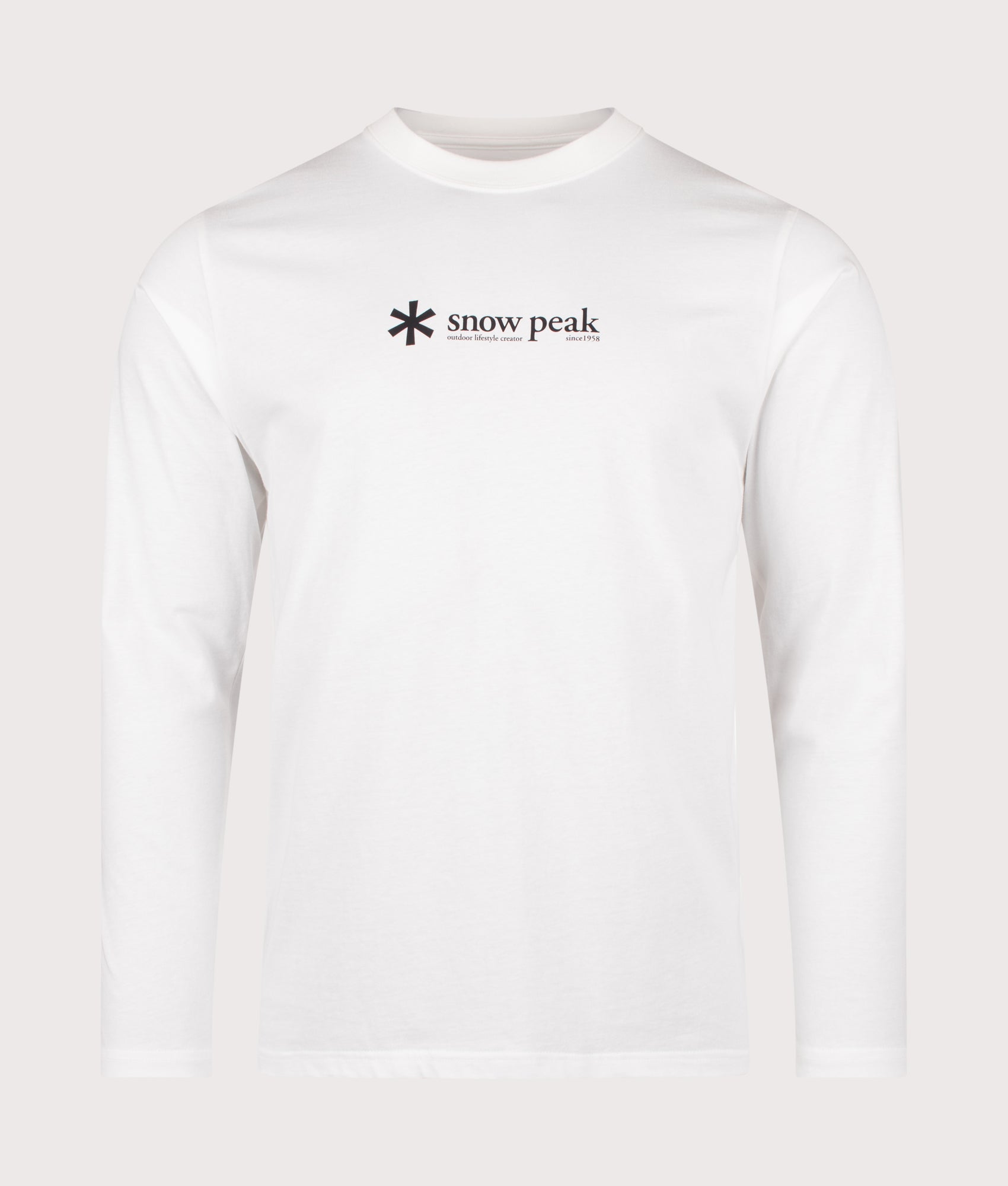 Snow Peak Soft Cotton Logo Long Sleeve T-Shirt in White at EQVVS Menswear. Front shot.