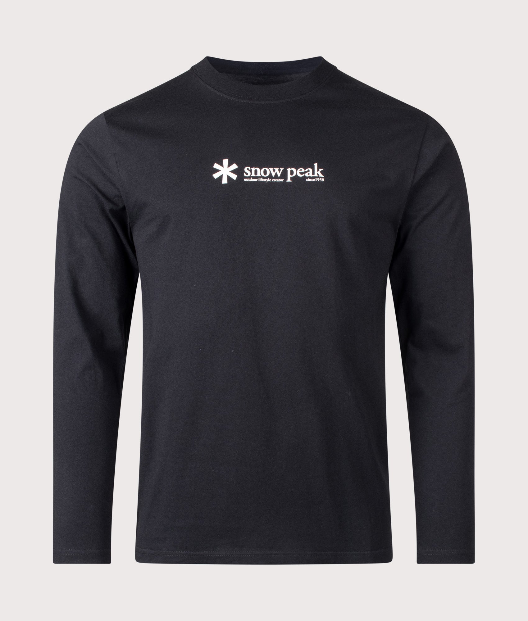 Snow Peak Soft Cotton Logo Long Sleeve T-Shirt in Black at EQVVS Menswear. Front shot.