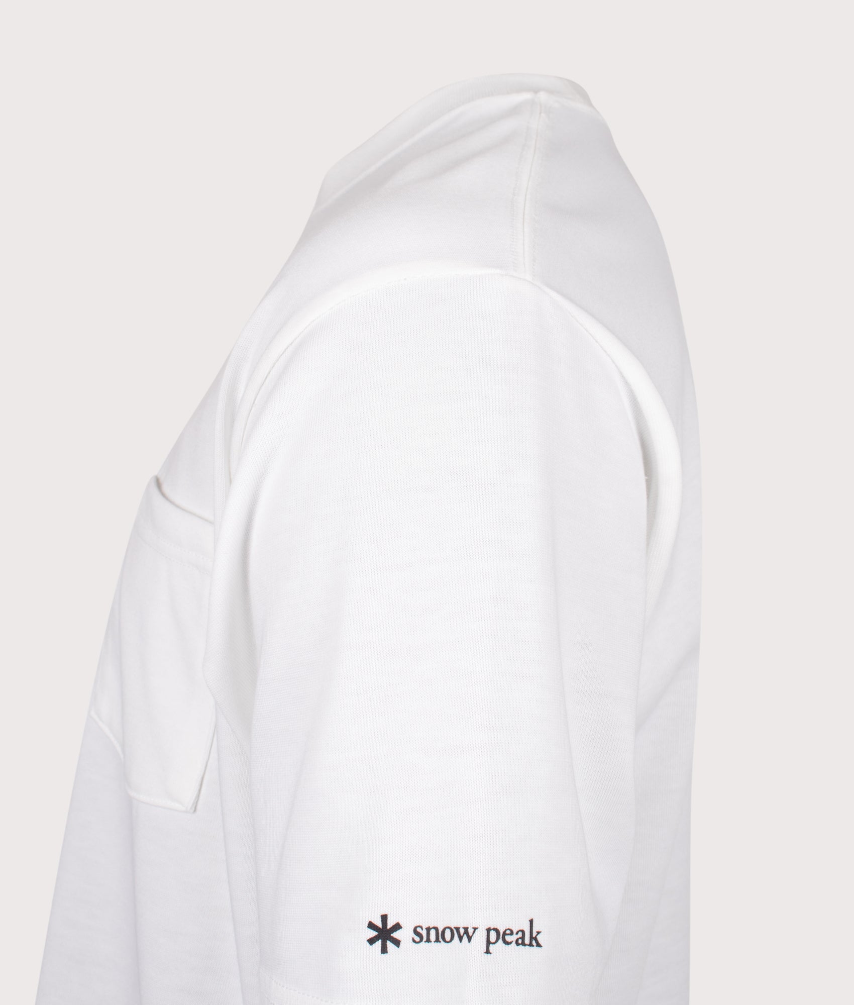 Snow Peak New Standard Pocket T-Shirt in Off White at EQVVS Menswear. Detail shot.