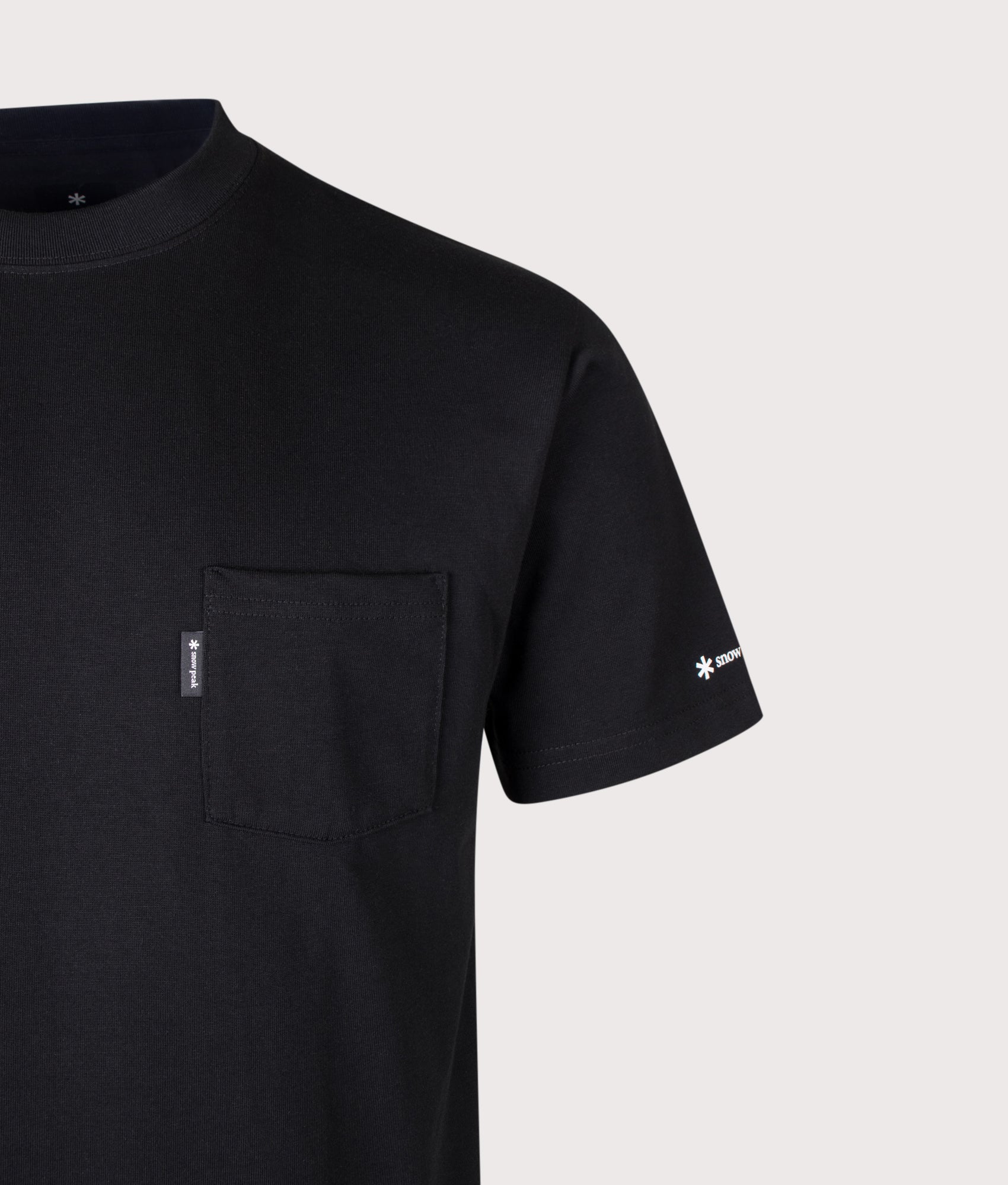 Snow Peak New Standard Pocket T-Shirt in Black at EQVVS Menswear. Detail shot.