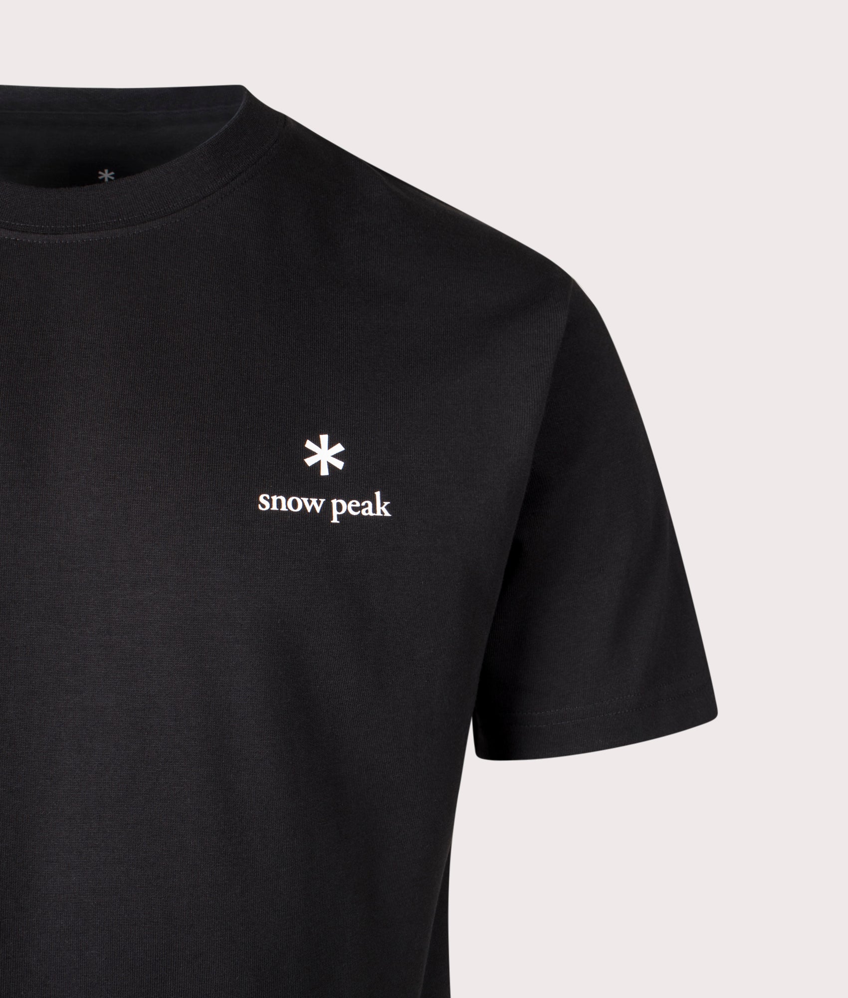 New Standard Logo T-Shirt in Black. Cotton blend | Snow Peak | Shot at EQVVS | Front detail shot