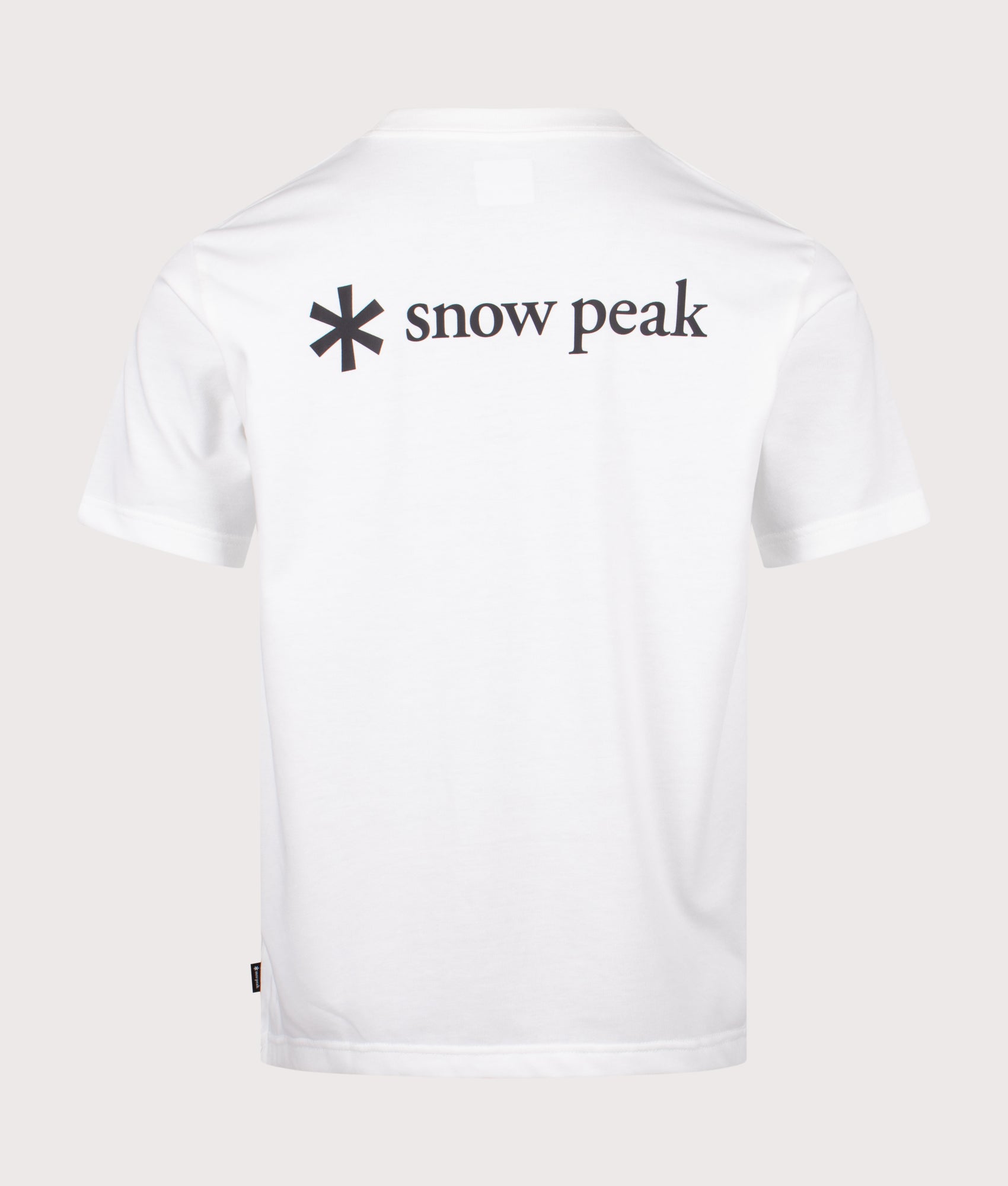 Snow Peak New Standard Back Printed Logo T-Shirt in Off White at EQVVS Menswear. Back shot.