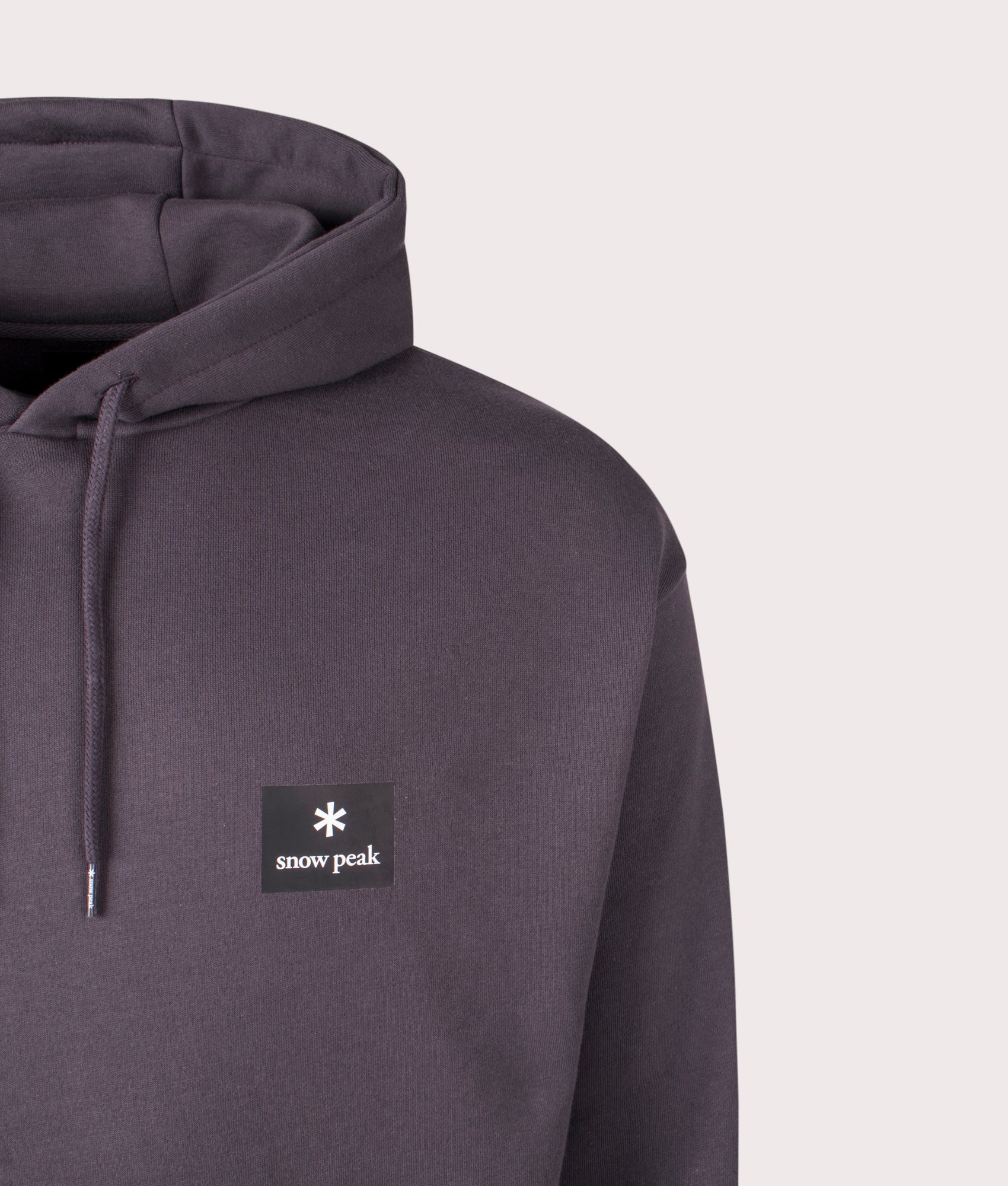 Square Logo Hoodie in Charcoal. Cotton-blend | Snow Peak | Shot at EQVVS | Front detail shot 
