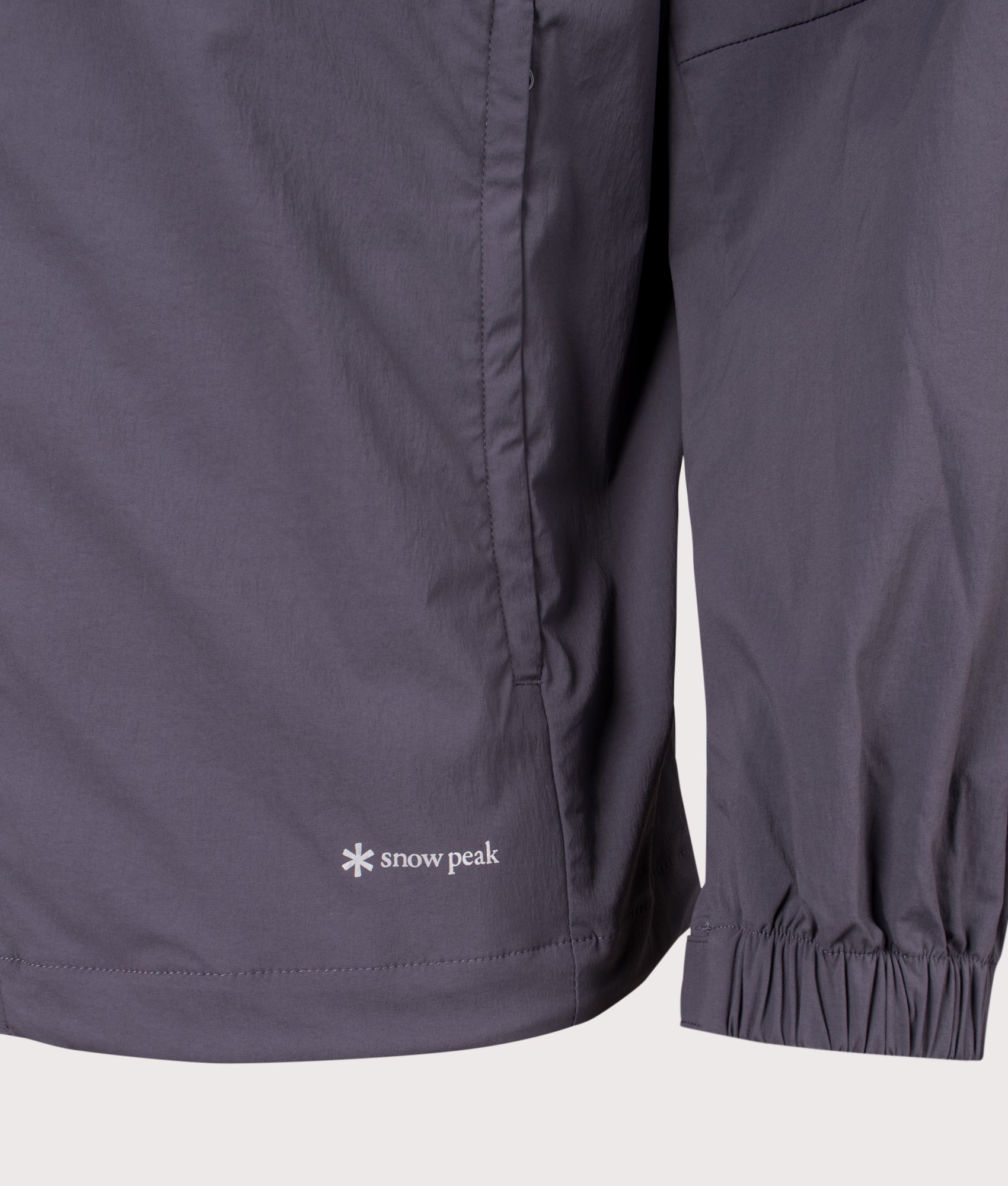 Utility Parka in Charcoal. | Snow Peak | Shot at EQVVS | Front hem detail shot 