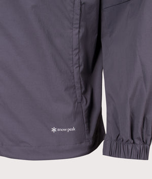 Utility Parka in Charcoal. | Snow Peak | Shot at EQVVS | Front hem detail shot 