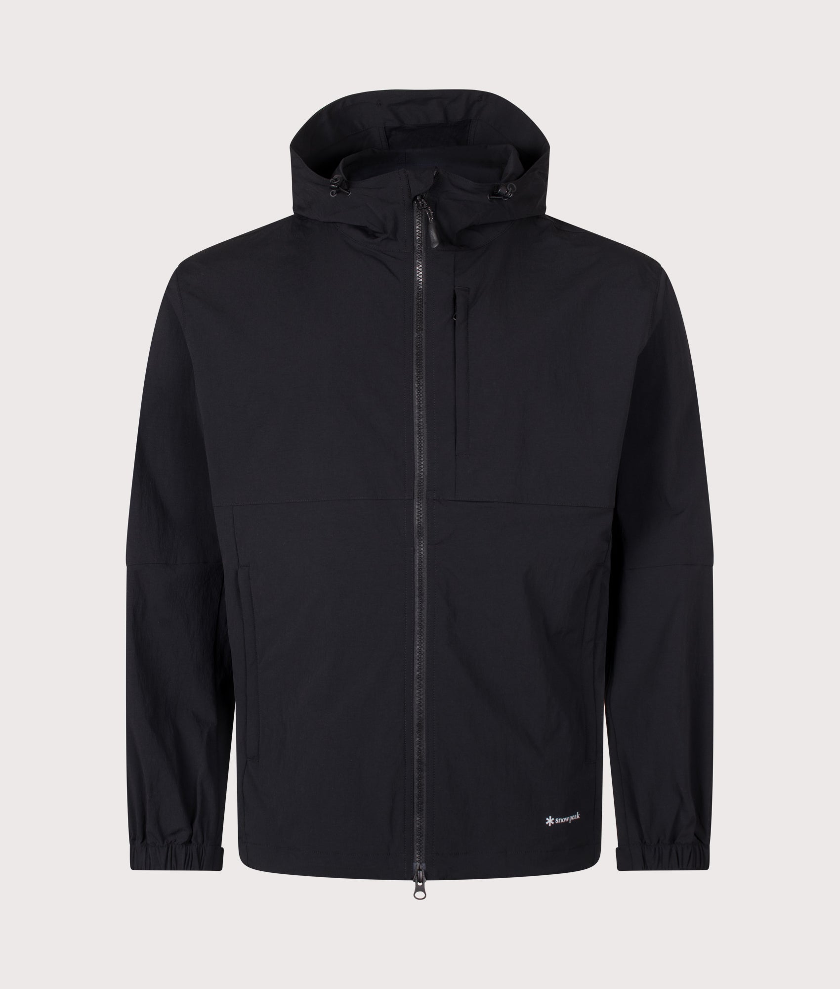 Snow Peak Relaxed Fit New Standard Utility Parka in Black at EQVVS Menswear. Front shot.