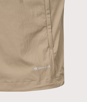 Utility Vest in Greige. | Snow Peak | Shot at EQVVS | Front hem detail shot 