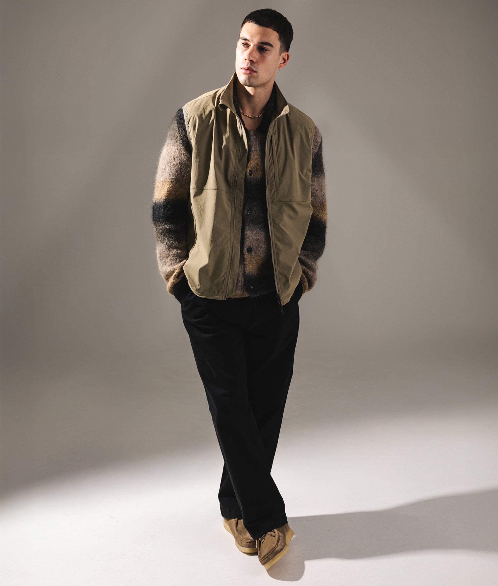 Utility Vest in Greige. | Snow Peak | Shot at EQVVS | Front model shot 