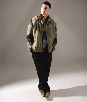 Utility Vest in Greige. | Snow Peak | Shot at EQVVS | Front model shot 