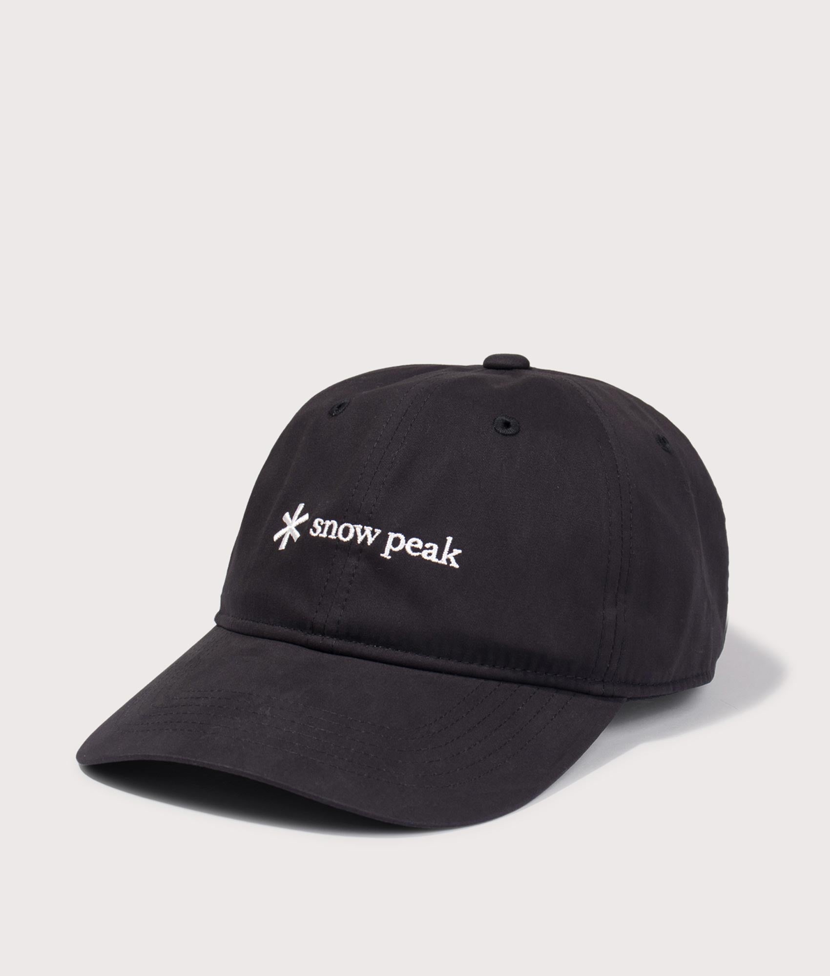 New Standard Logo Cap in Black by Snow Peak. Shot by EQVVS. Front angled shot.