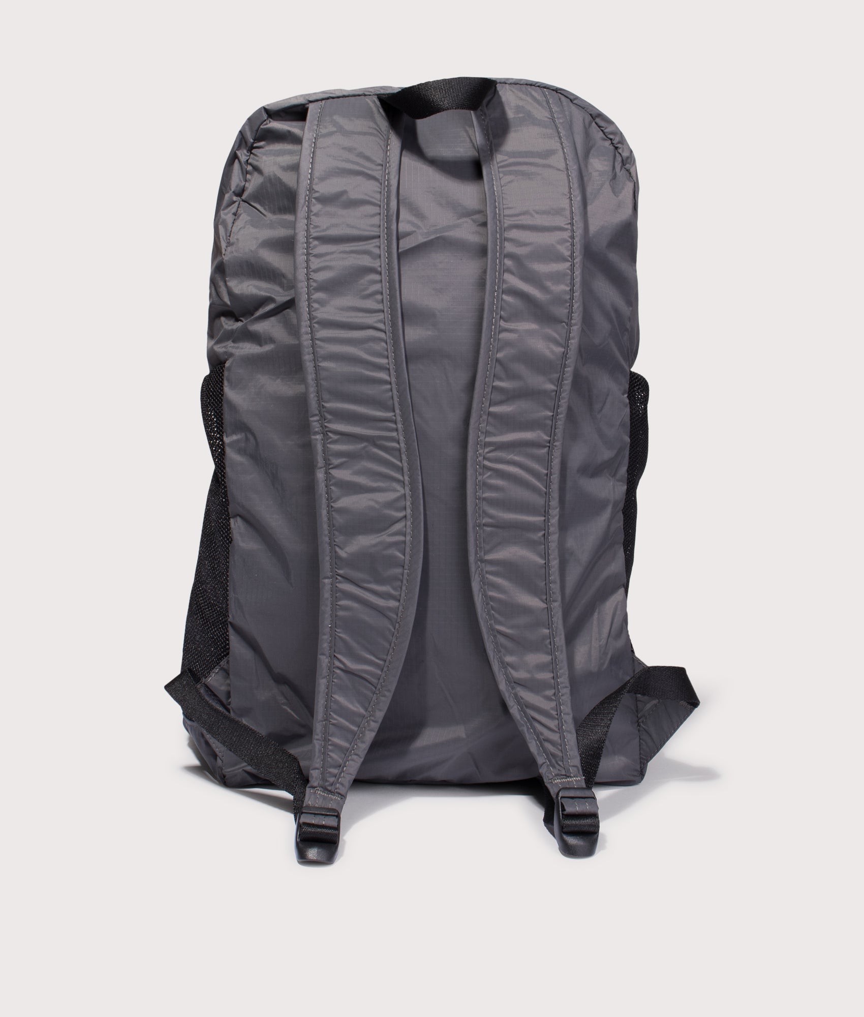 Packable Backpack in Black . | Snow Peak | Shot at EQVVS | Strap shot 