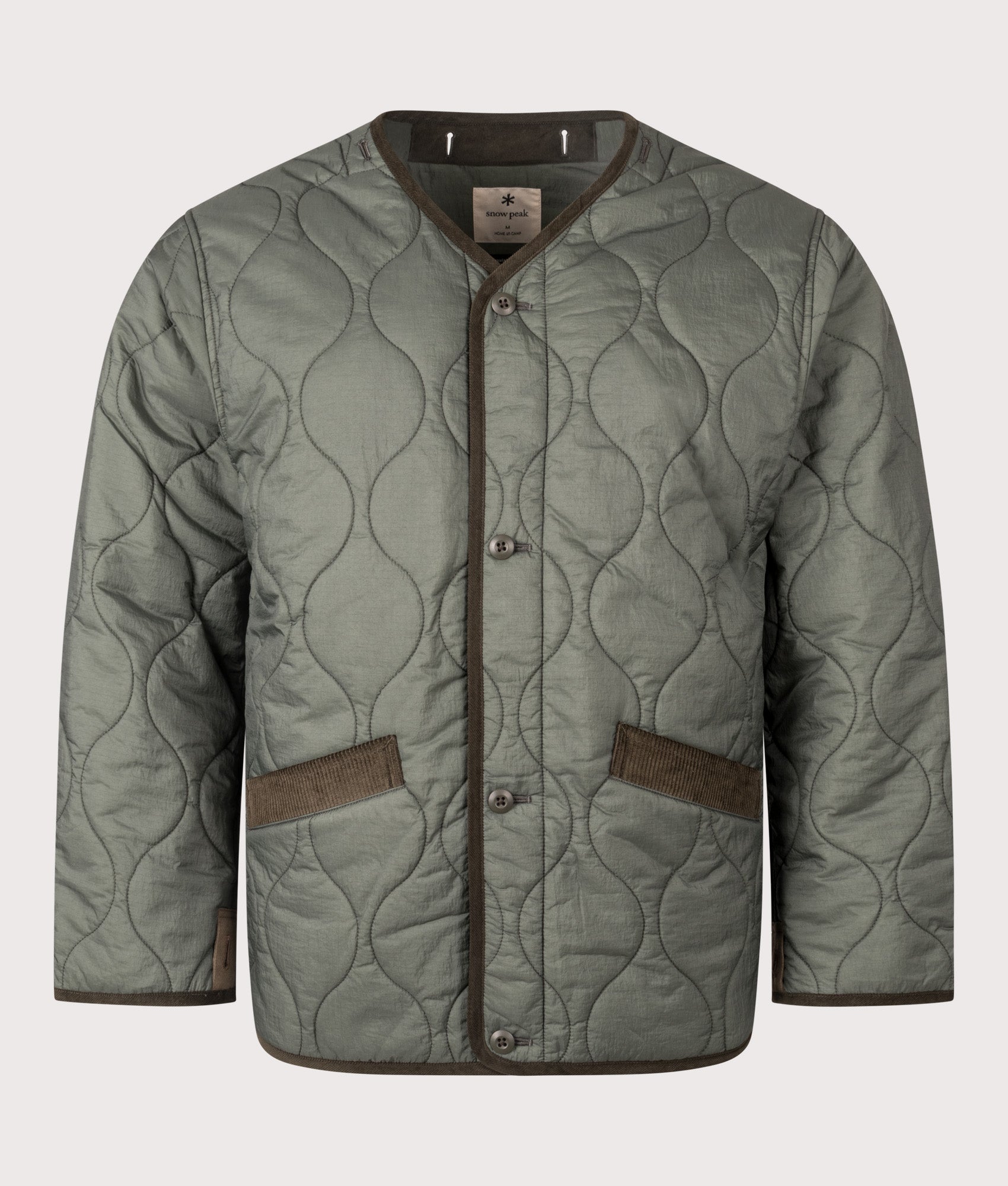 Snow Peak TAKIBI Ripstop Adjustable Jacket in Olive at EQVVS Menswear. Liner front shot.