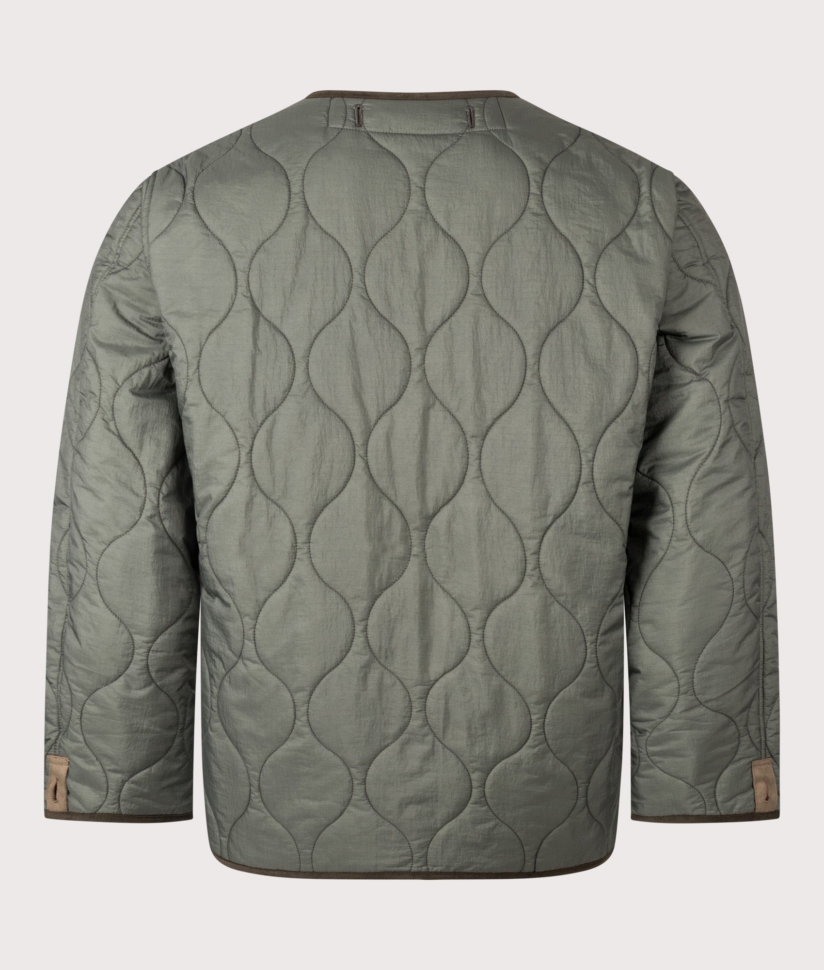 Snow Peak TAKIBI Ripstop Adjustable Jacket in Olive at EQVVS Menswear. Liner back shot.