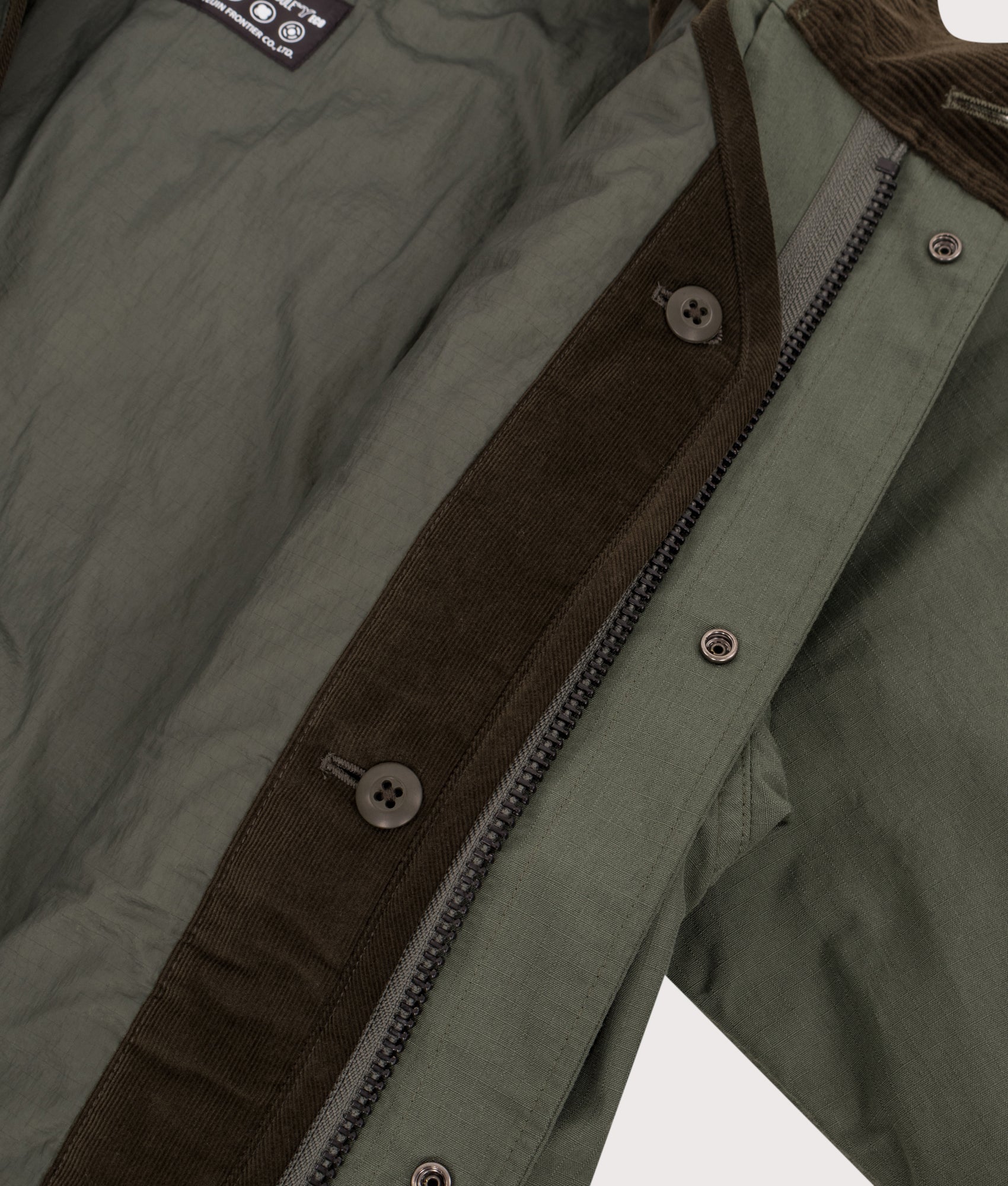 Snow Peak TAKIBI Ripstop Adjustable Jacket in Olive at EQVVS Menswear. Liner detail shot.