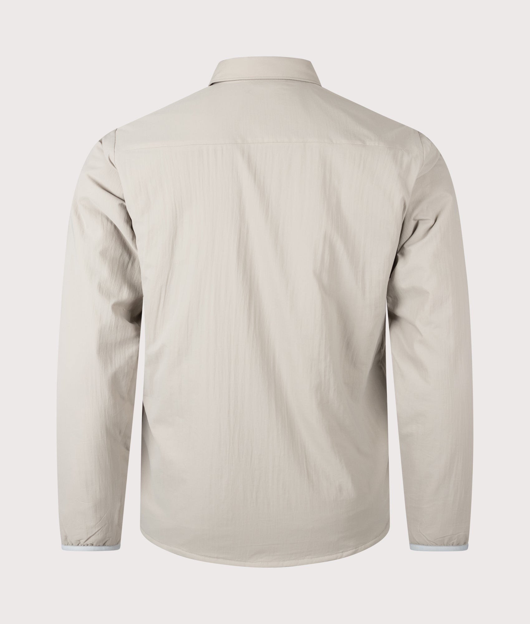 Snow Peak Flexible Insulated Shirt in Greige at EQVVS Menswear. Back shot.