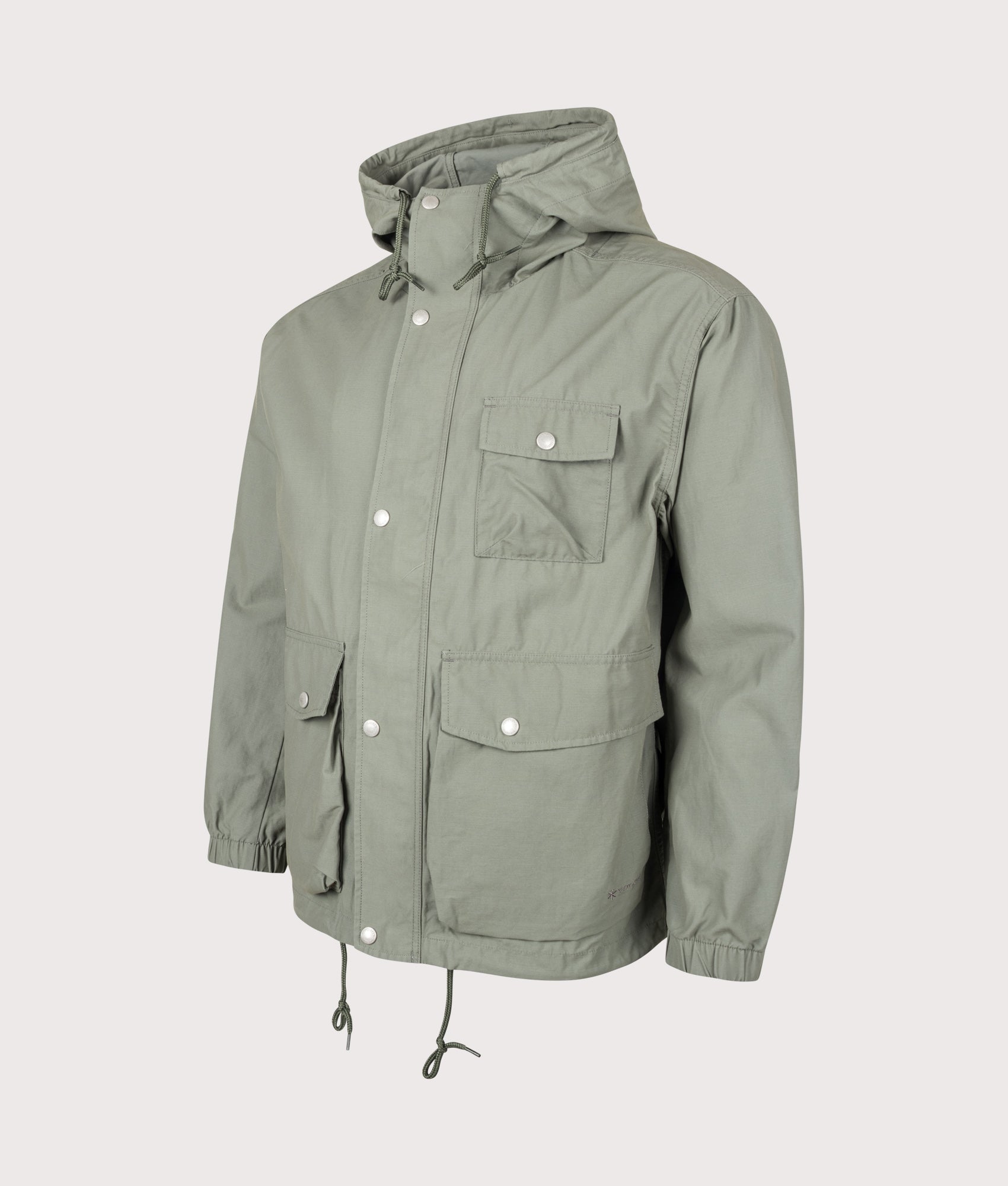 Snow Peak Light Dobby Cloth Parka in Foliage at EQVVS Menswear. Angled front shot.