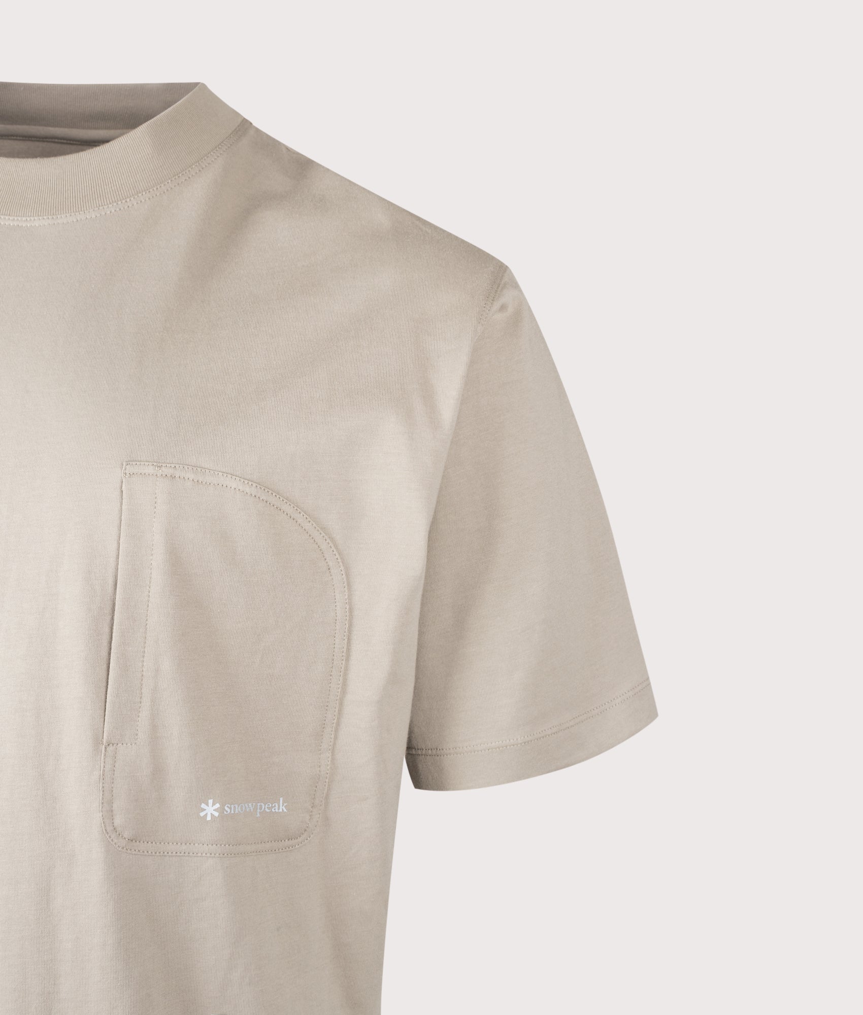 Snow Peak Relaxed Fit OG Mercerized T-Shirt in Greige at EQVVS Menswear. Detail shot.