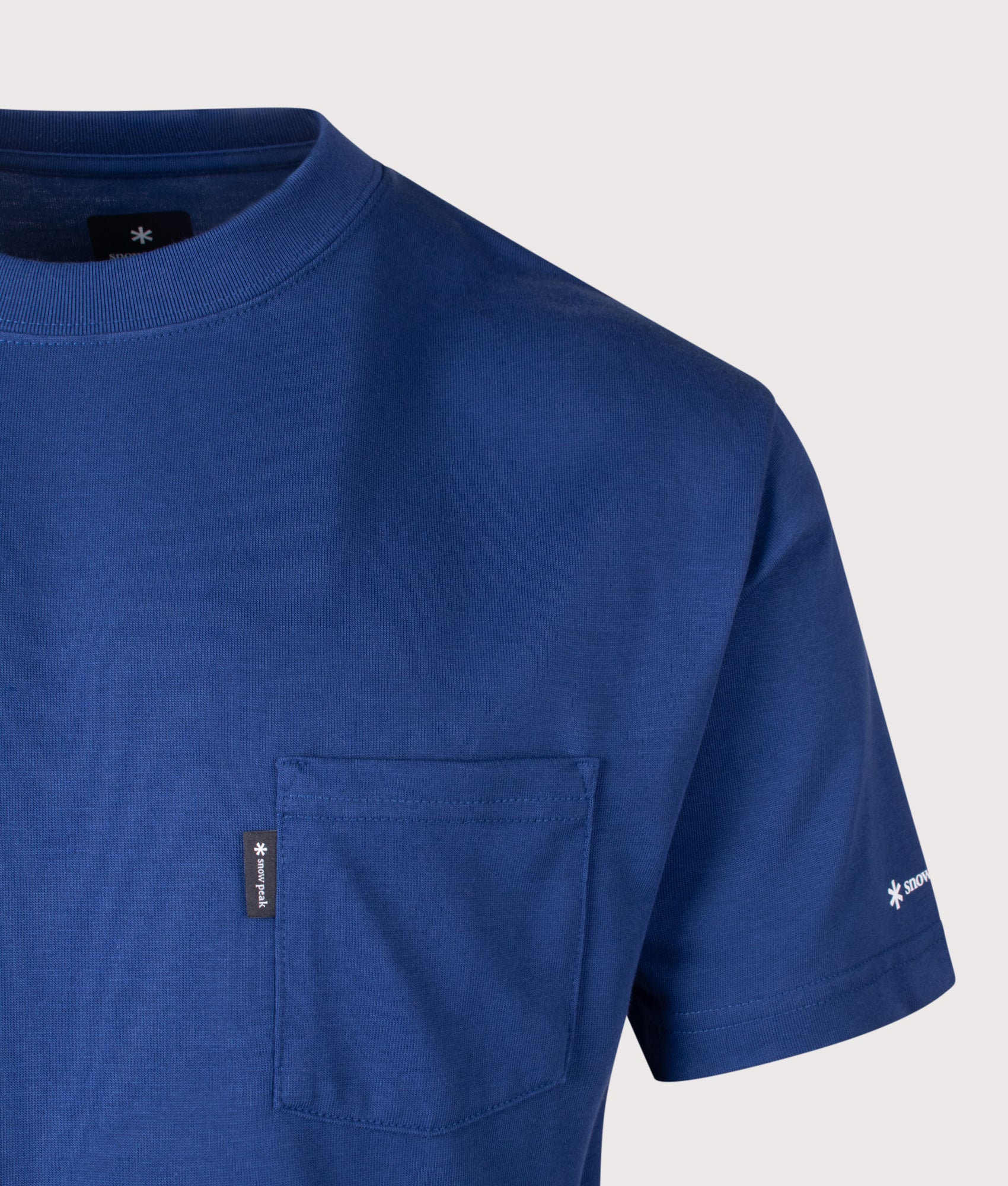 Snow Peak New Standard Pocket T-Shirt in Blue at EQVVS Menswear. Detail shot.