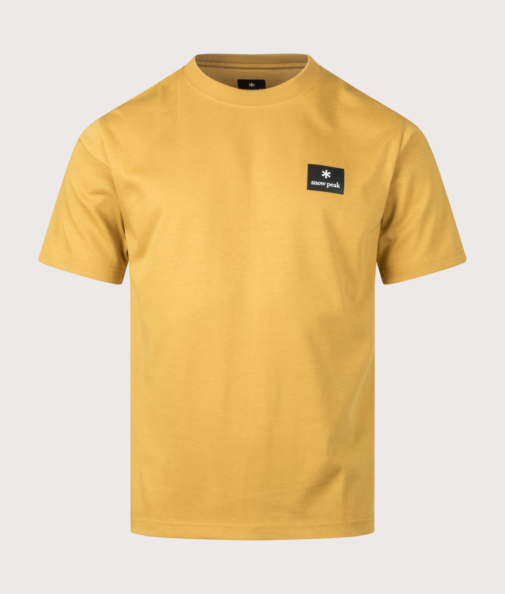 Snow Peak New Standard Square Logo T-Shirt in Yellow at EQVVS Menswear. Front shot.