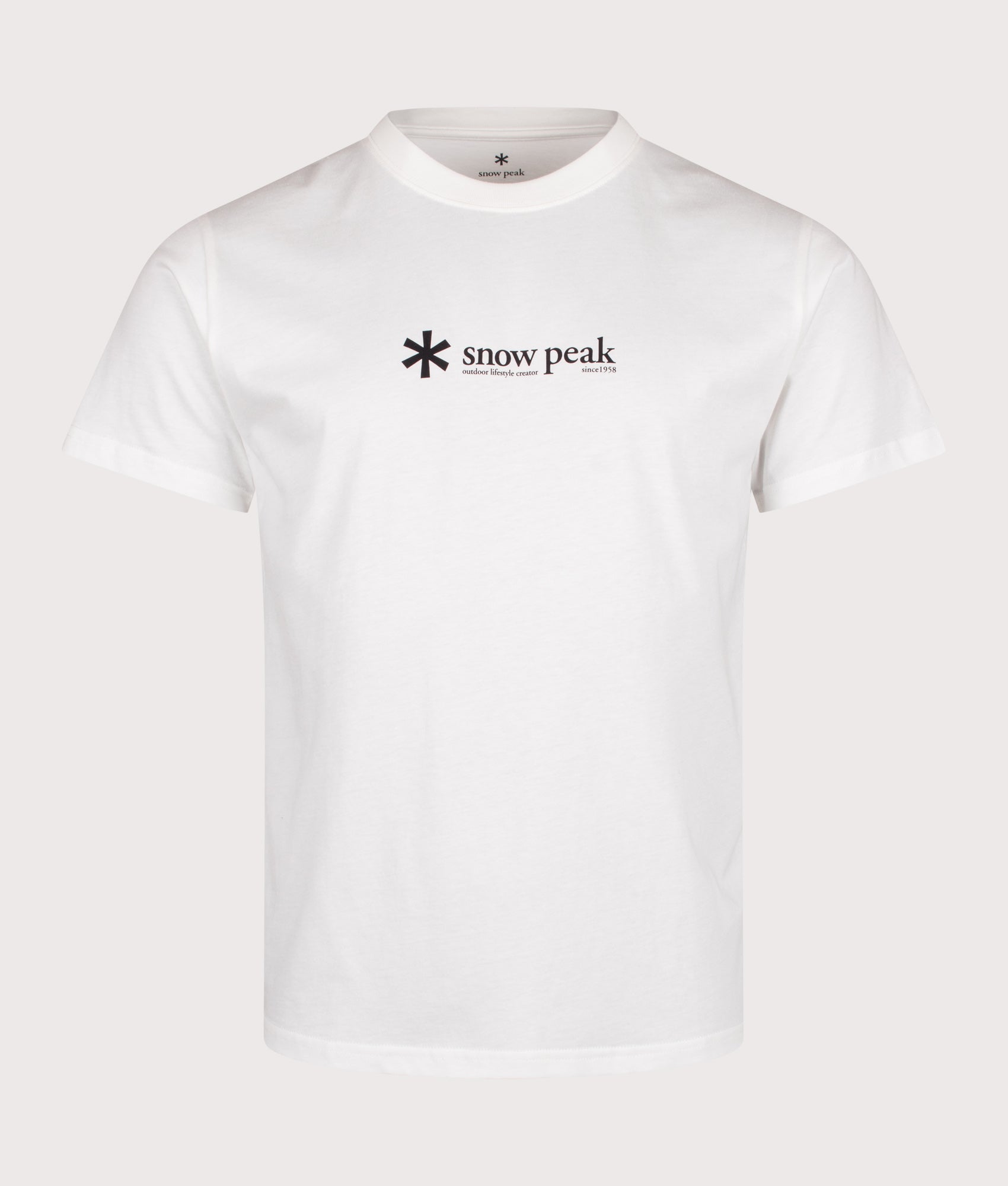 Snow Peak Regular Fit Soft Cotton Logo T-Shirt in Off White at EQVVS Menswear. Front shot.