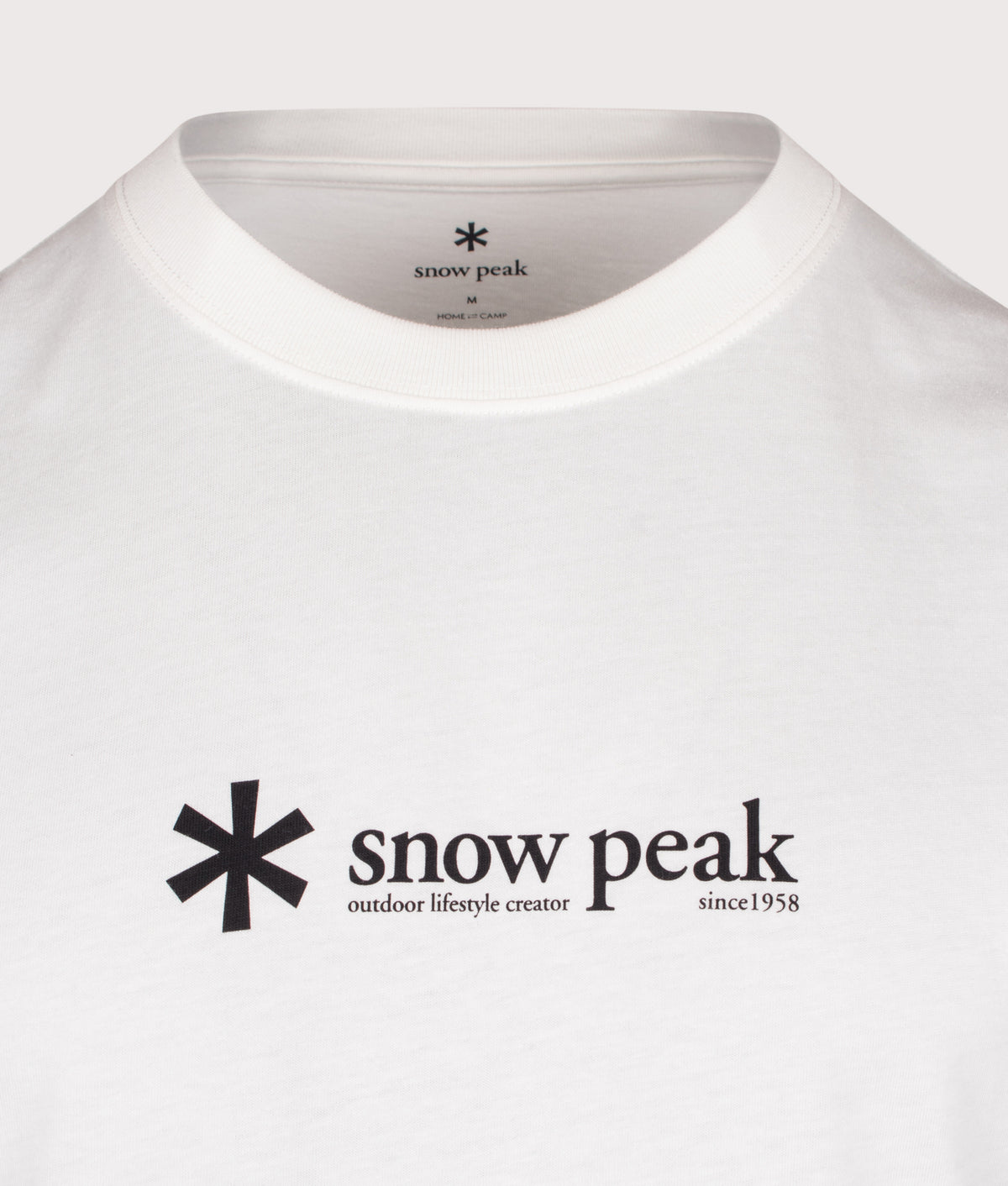 Snow Peak Regular Fit Soft Cotton Logo T-Shirt in Off White at EQVVS Menswear.  Detail shot.