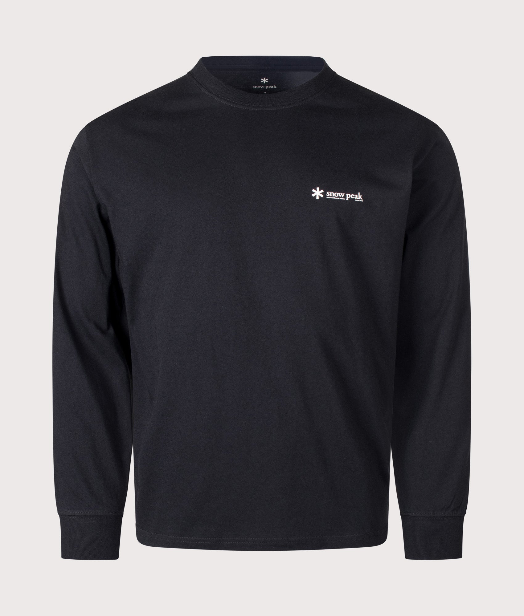 Snow Peak Relaxed Fit Long Sleeve Logo T-Shirt in Black at EQVVS Menswear. Front shot.