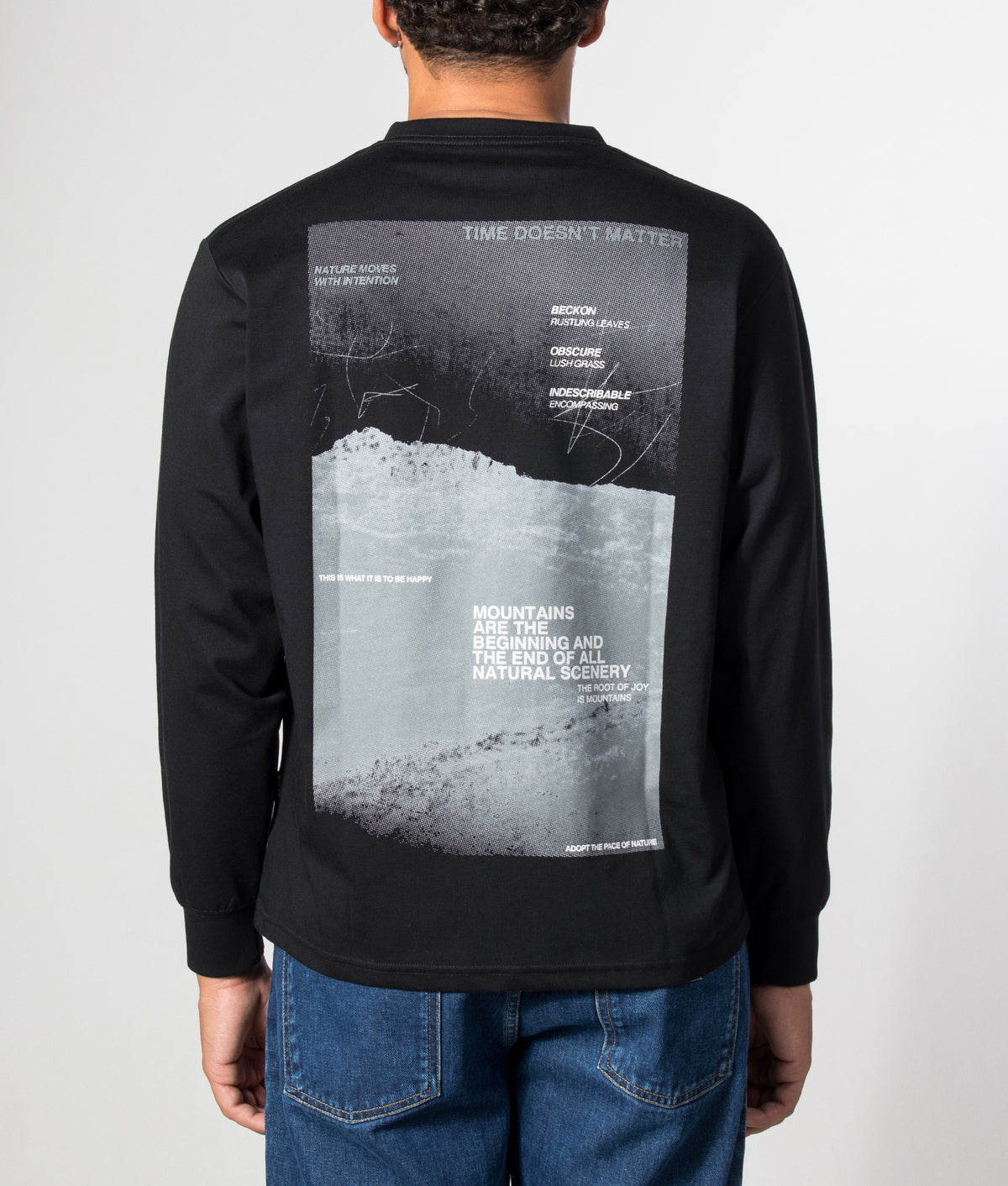 Snow Peak Relaxed Fit Campscape Long Sleeve T-Shirt in Black at EQVVS Menswear. Model front shot.