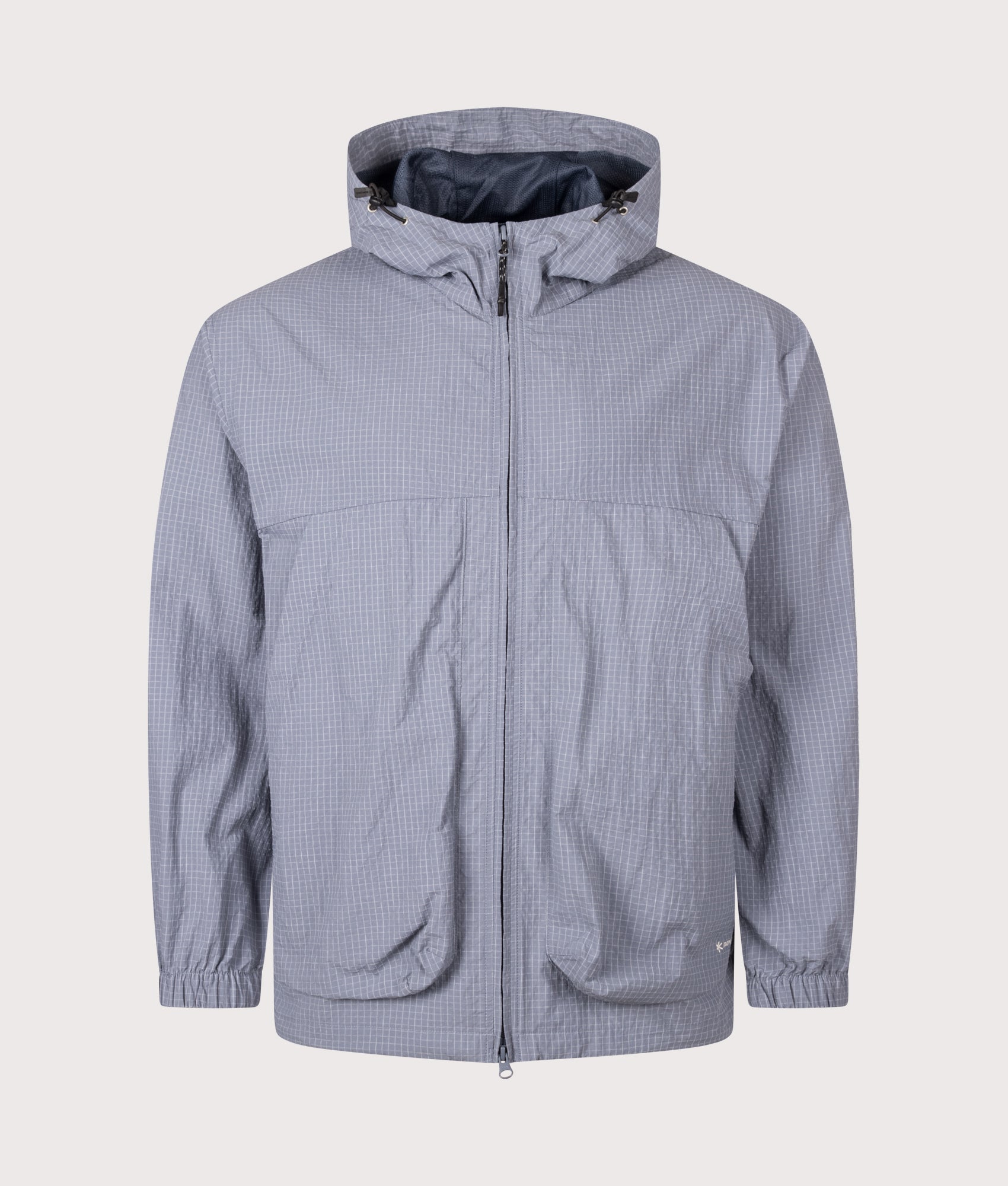 Snow Peak KASURI Ripstop Jacket in Light Blue at EQVVS Menswear. Front shot.