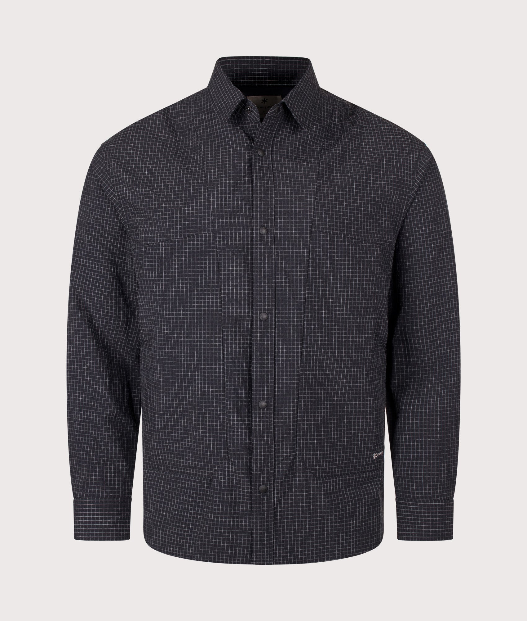 Snow Peak Relaxed Fit KASURI Ripstop Shirt in Black at EQVVS Menswear. Front shot.