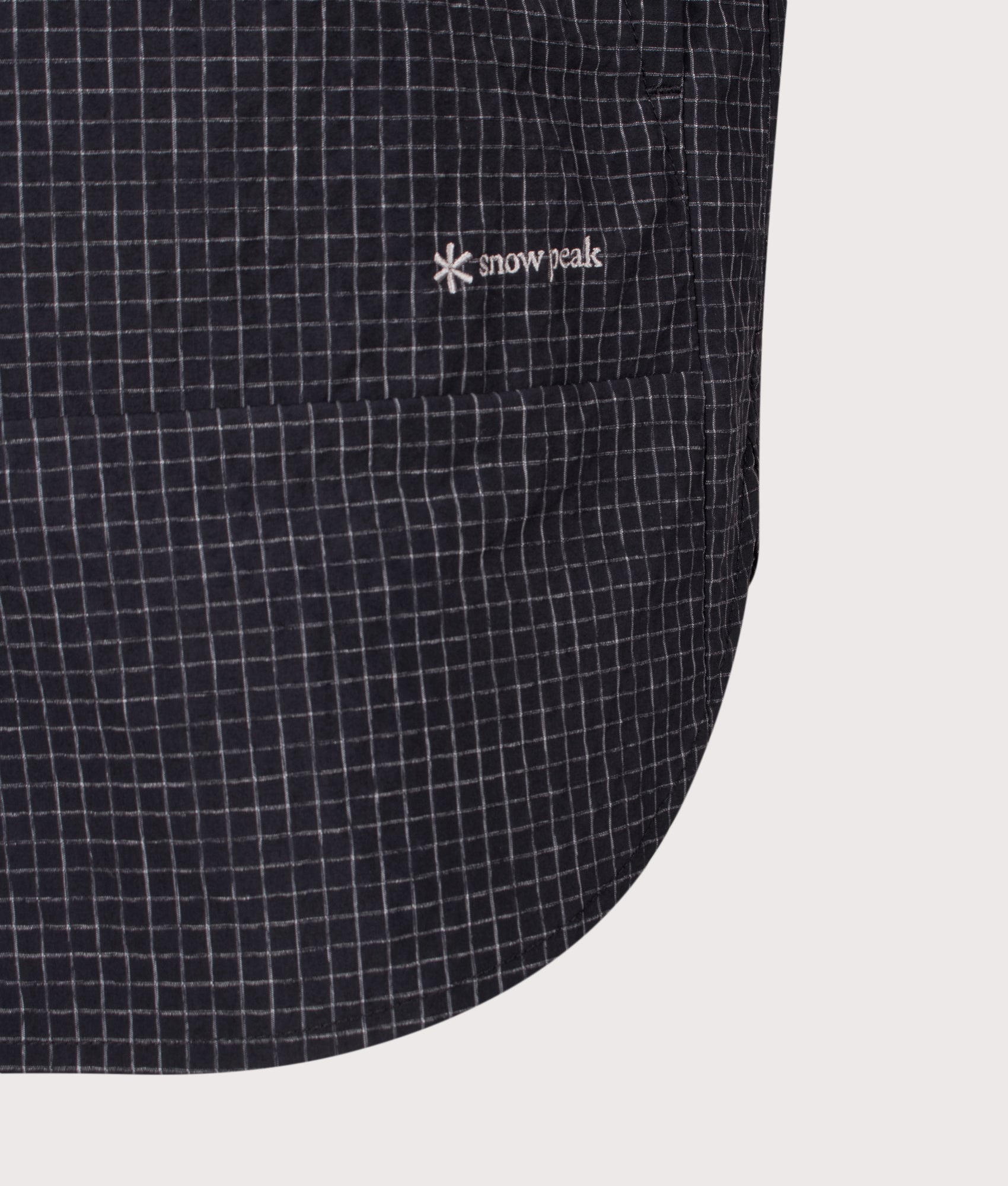 Snow Peak Relaxed Fit KASURI Ripstop Shirt in Black at EQVVS Menswear. Detail shot.