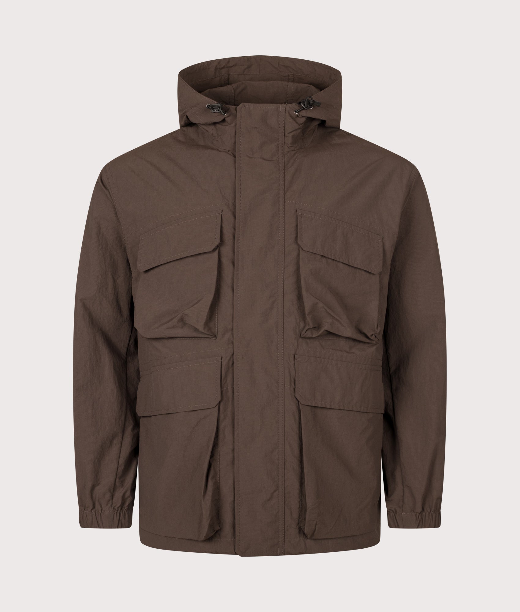 Snow Peak Regular Fit Nylon Double Rip Jacket in Dark Brown at EQVVS Menswear. Front shot.