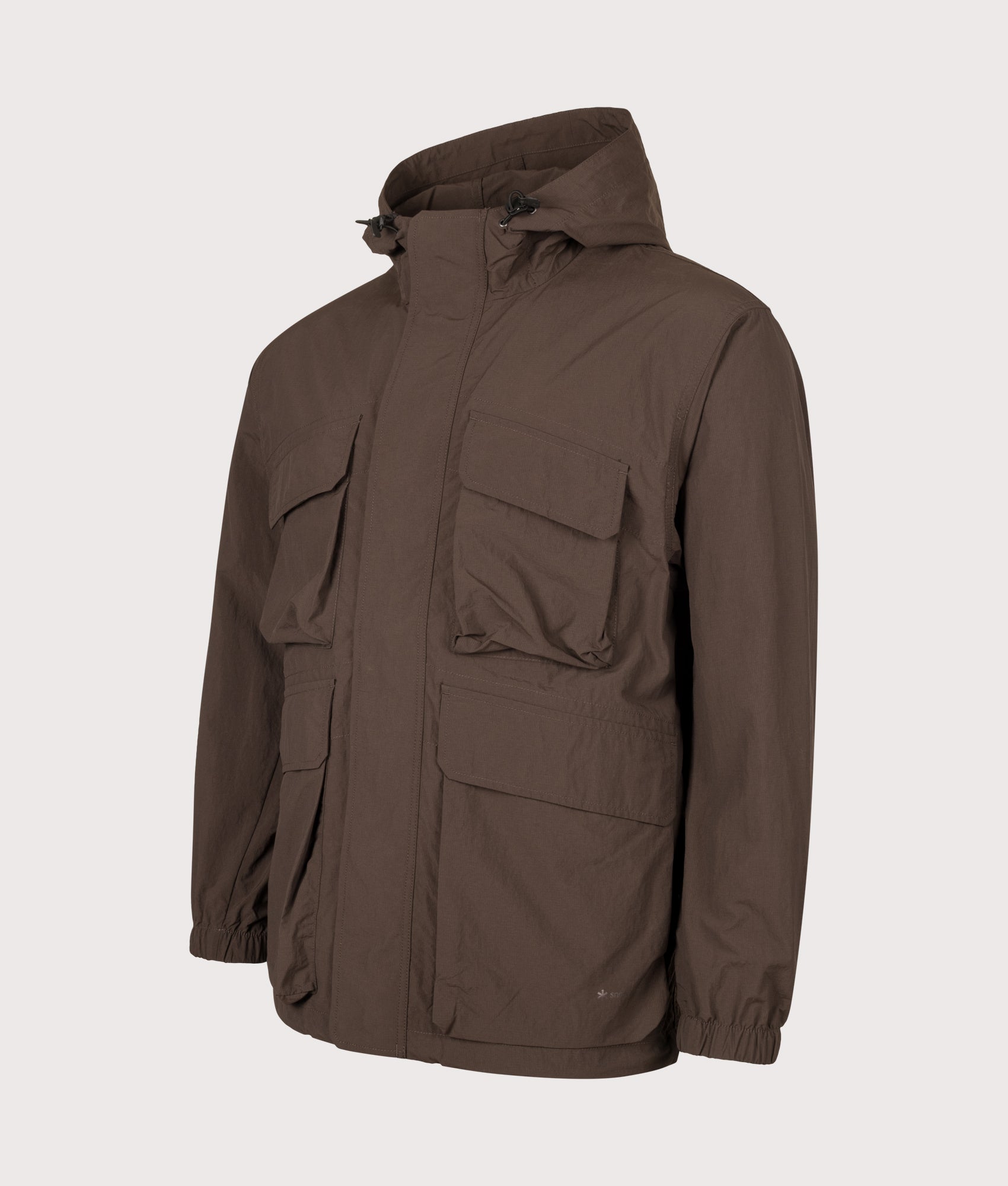 Snow Peak Regular Fit Nylon Double Rip Jacket in Dark Brown at EQVVS Menswear. Angled front shot.