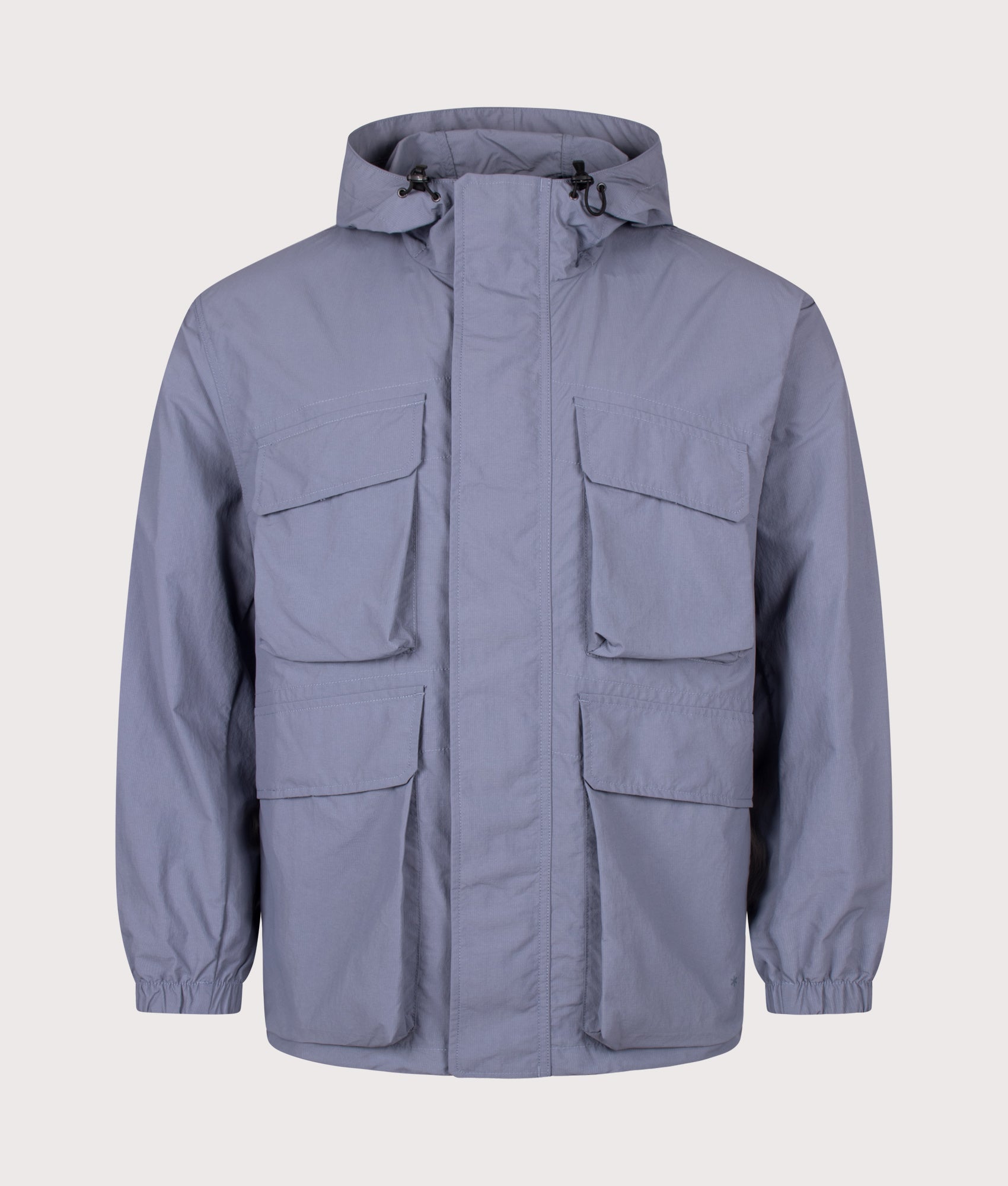 Snow Peak Regular Fit Nylon Double Rip Jacket in Light Blue at EQVVS Menswear. Front shot.