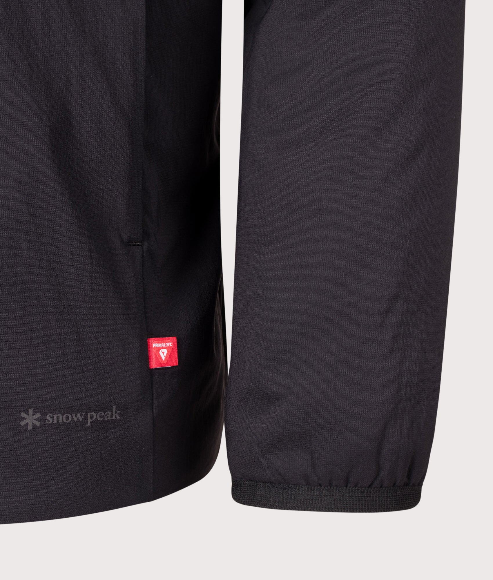 Snow Peak Regular Fit Flexible Insulated Shirt in Black at EQVVS Menswear. Detail shot.