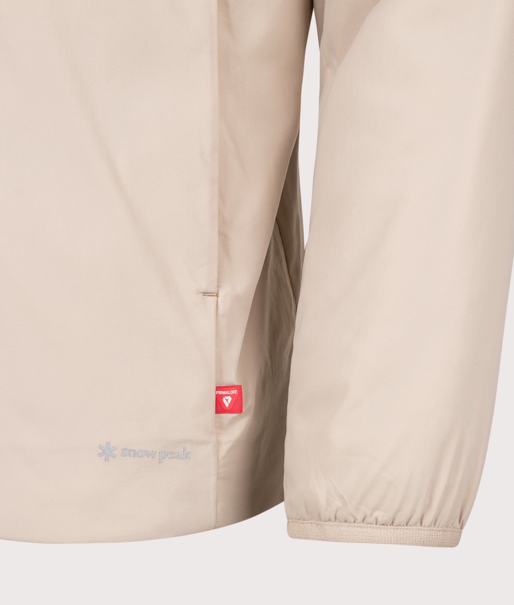 Snow Peak Regular Fit Flexible Insulated Shirt in Light Brown at EQVVS Menswear. Detail shot.