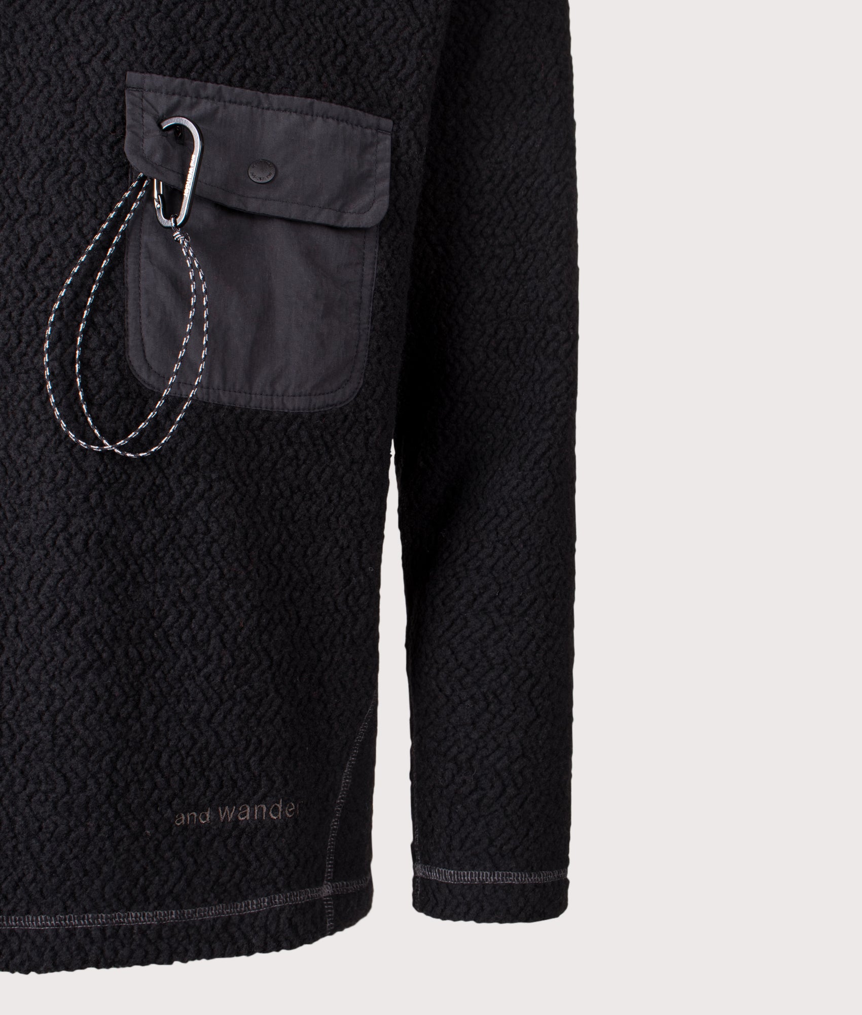 And Wander Re Wool JQ Crew Sweatshirt in Black at EQVVS Menswear. Detail shot.