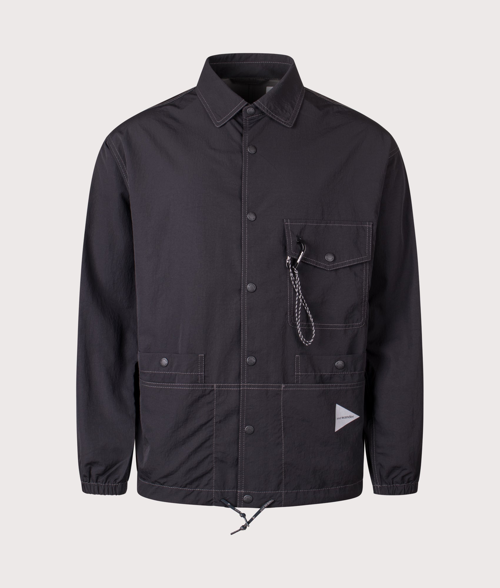 And Wander Crinkled Nylon Overshirt Jacket in Black at EQVVS Menswear. Front shot.