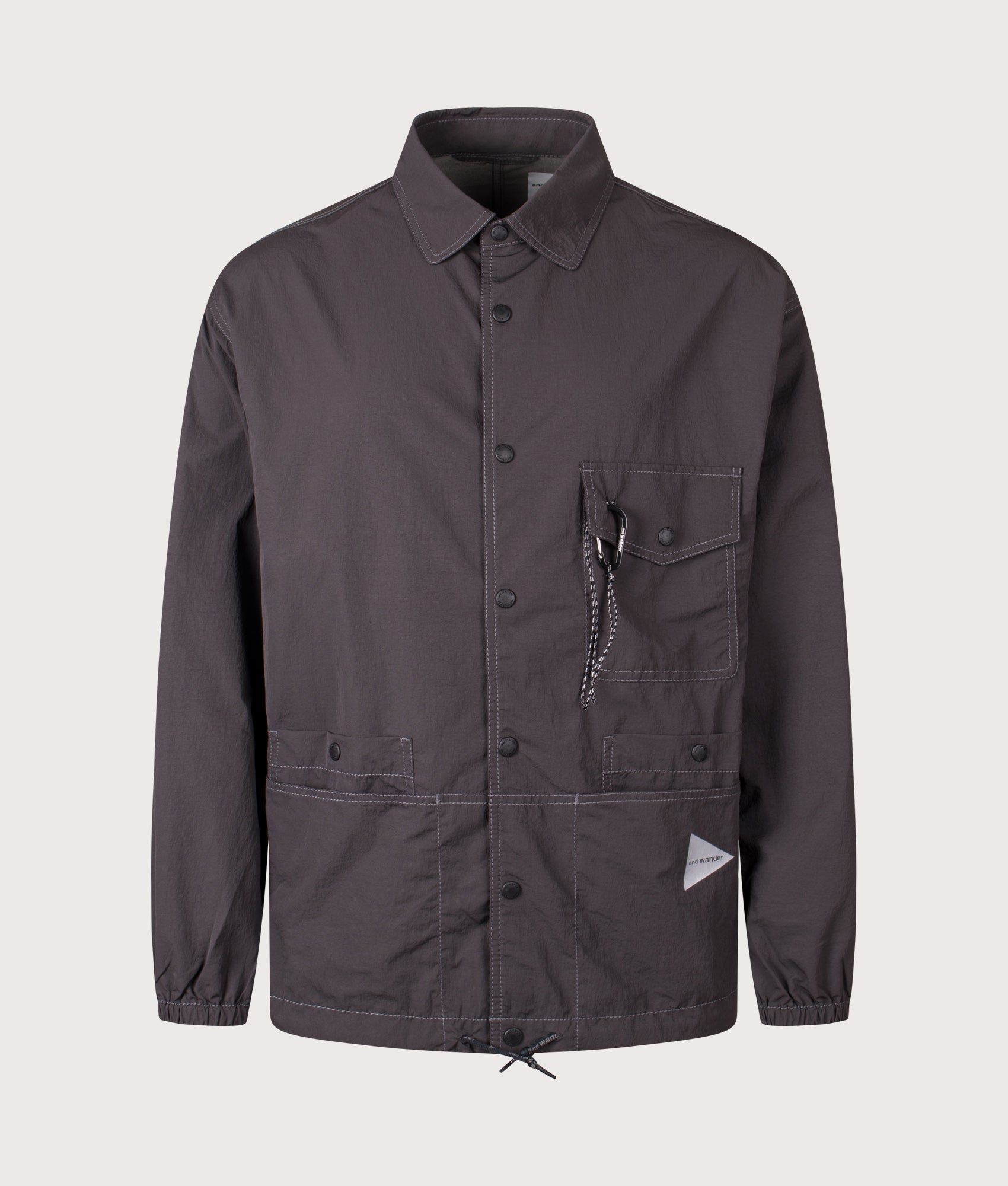 And Wander Crinkled Nylon Overshirt Jacket in Charcoal a EQVVS Menswear. Front shot.