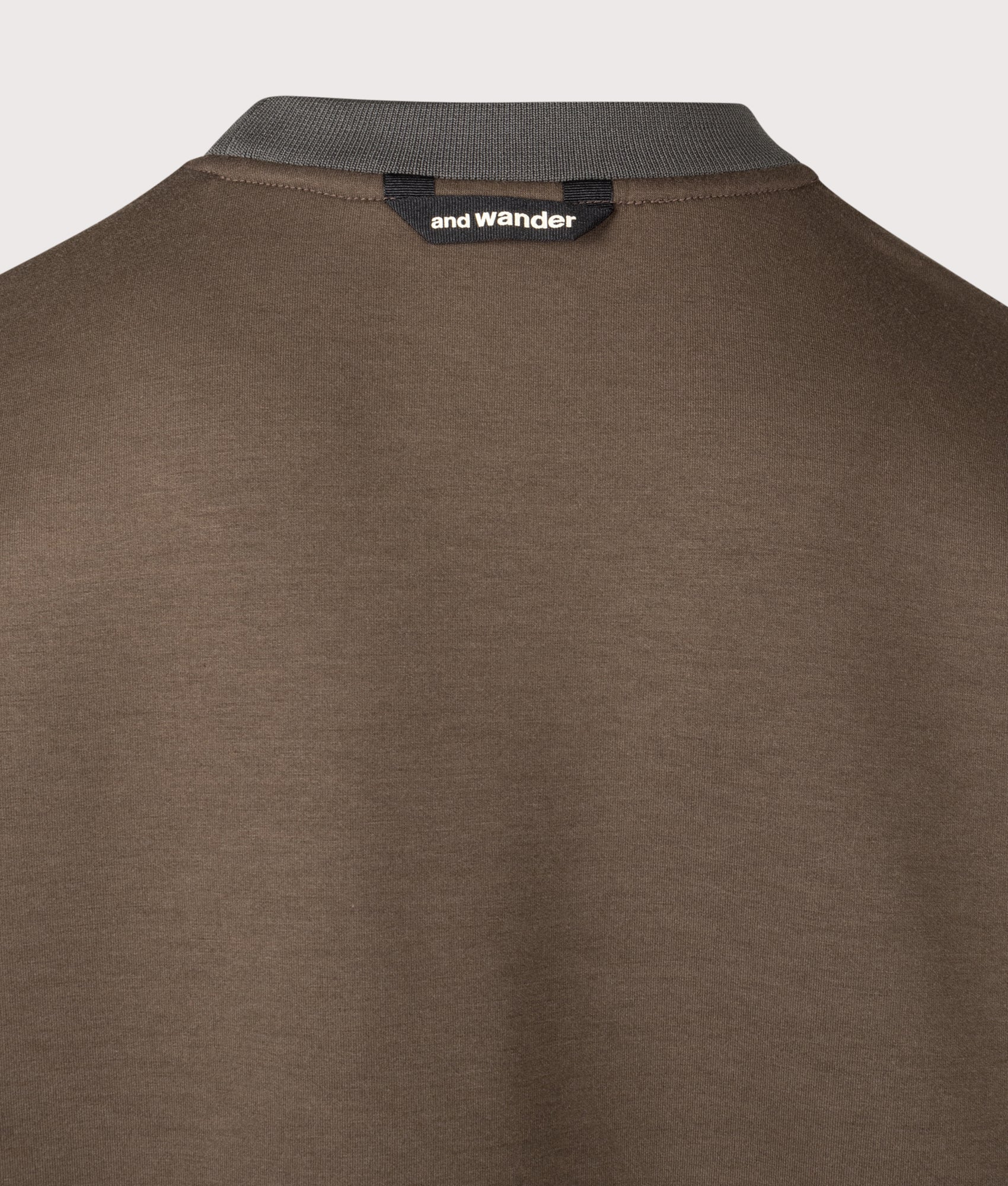 and wander Airy Warm Sweatshirt in Dark Brown at EQVVS Menswear. Back detail shot.