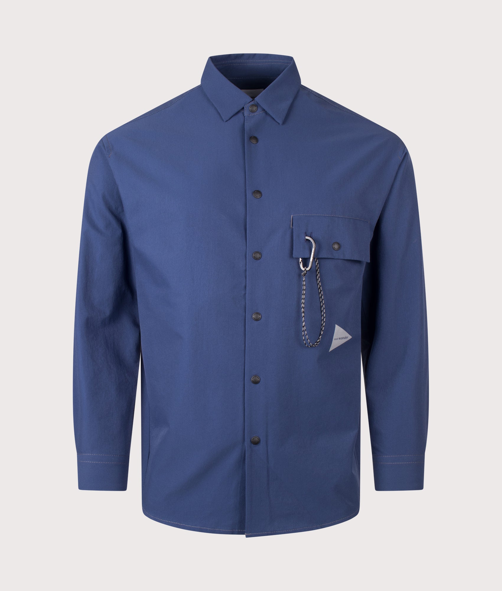 and wander Dry Breathable Shirt in Blue at EQVVS Menswear. Front shot.