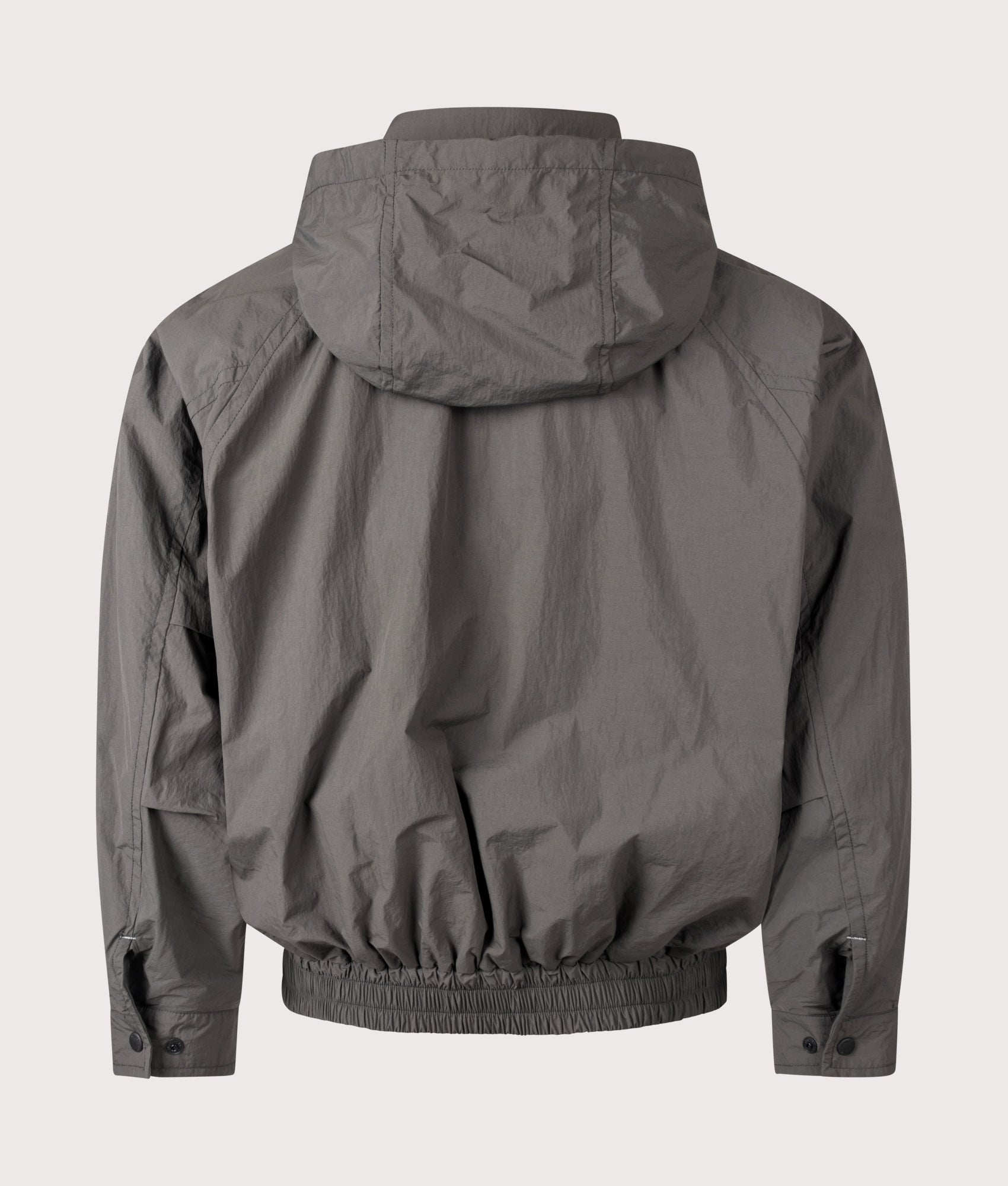 and wander Water Repellant Light Jacket 2 in Charcoal at EQVVS Menswear. Back shot.