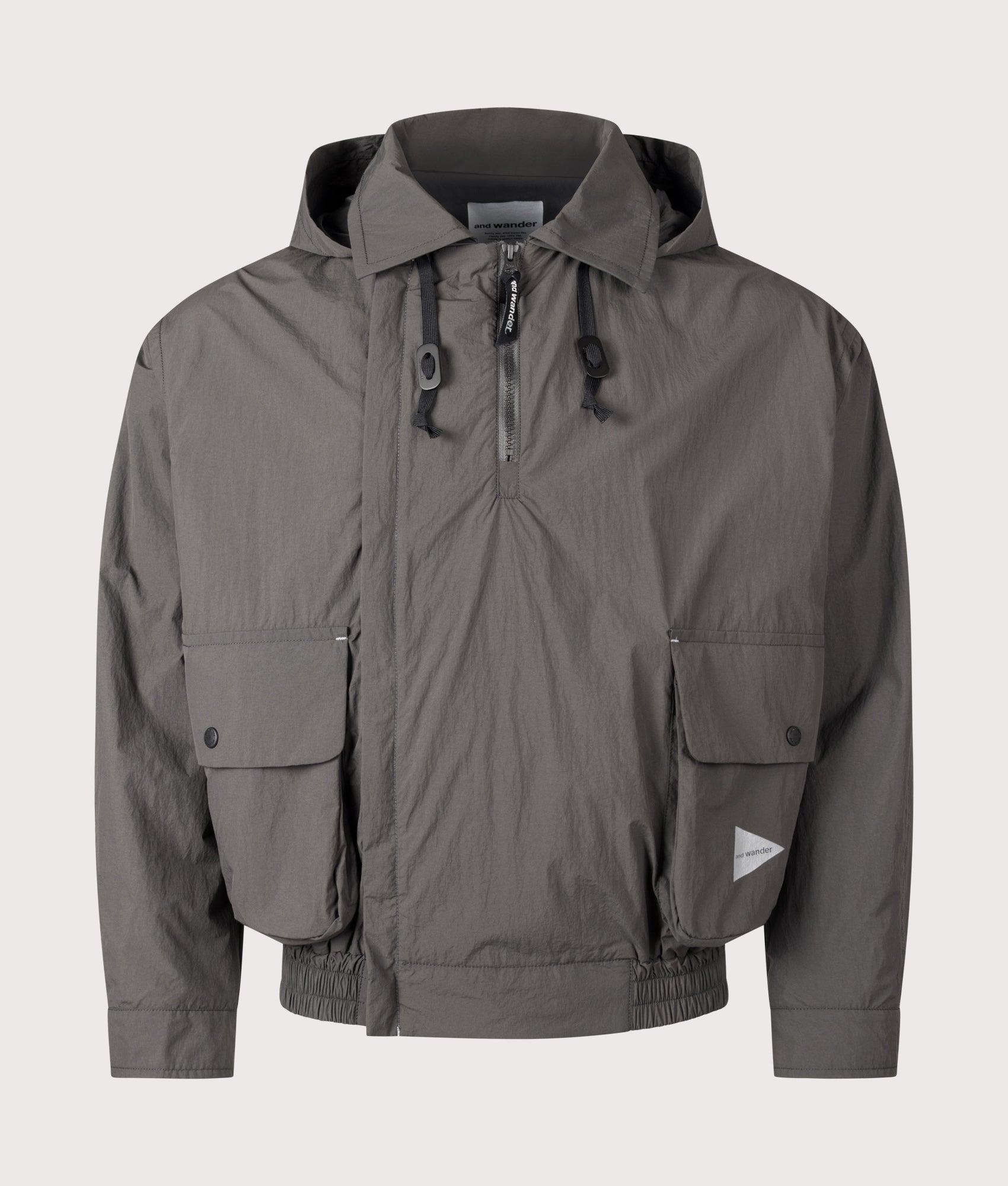 and wander Water Repellant Light Jacket 2 in Charcoal at EQVVS Menswear. Front shot.