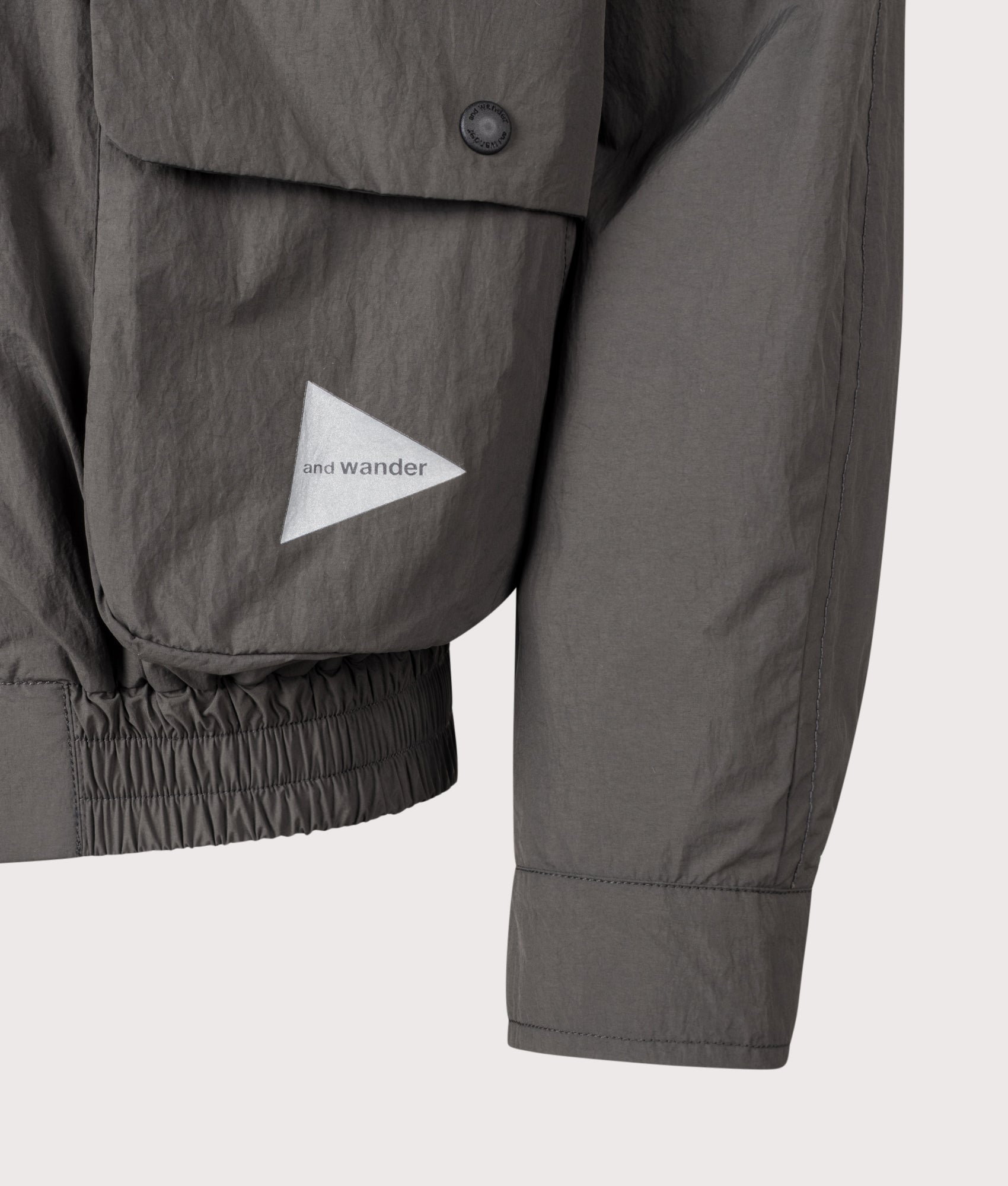 and wander Water Repellant Light Jacket 2 in Charcoal at EQVVS Menswear. Detail shot.