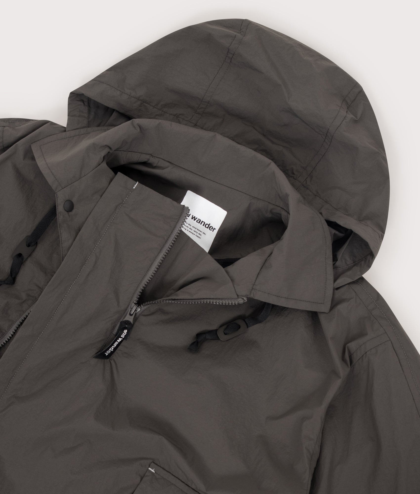 and wander Water Repellant Light Jacket 2 in Charcoal at EQVVS Menswear. Detail 3.